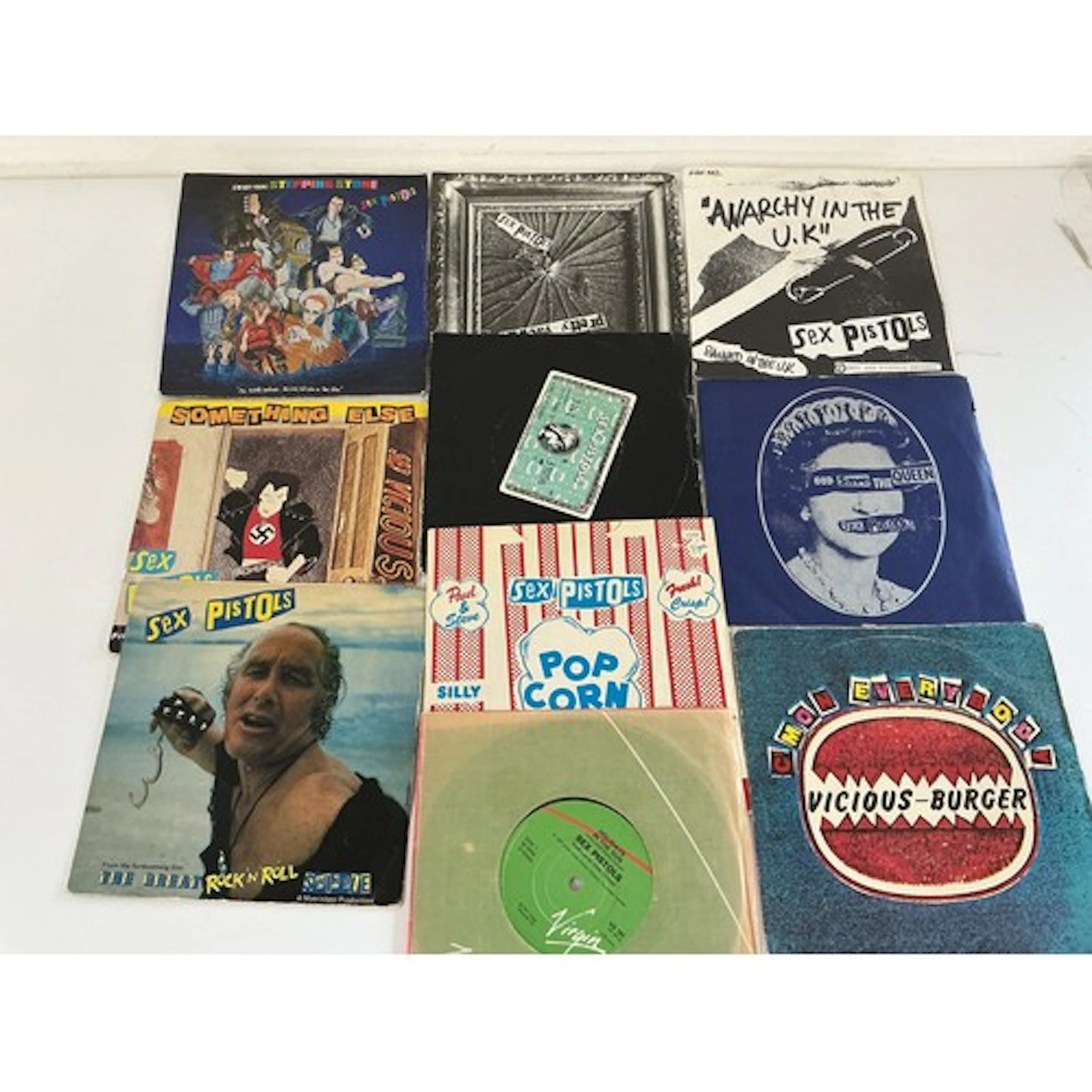 Two Sex Pistols LPs and ten 7” singles.