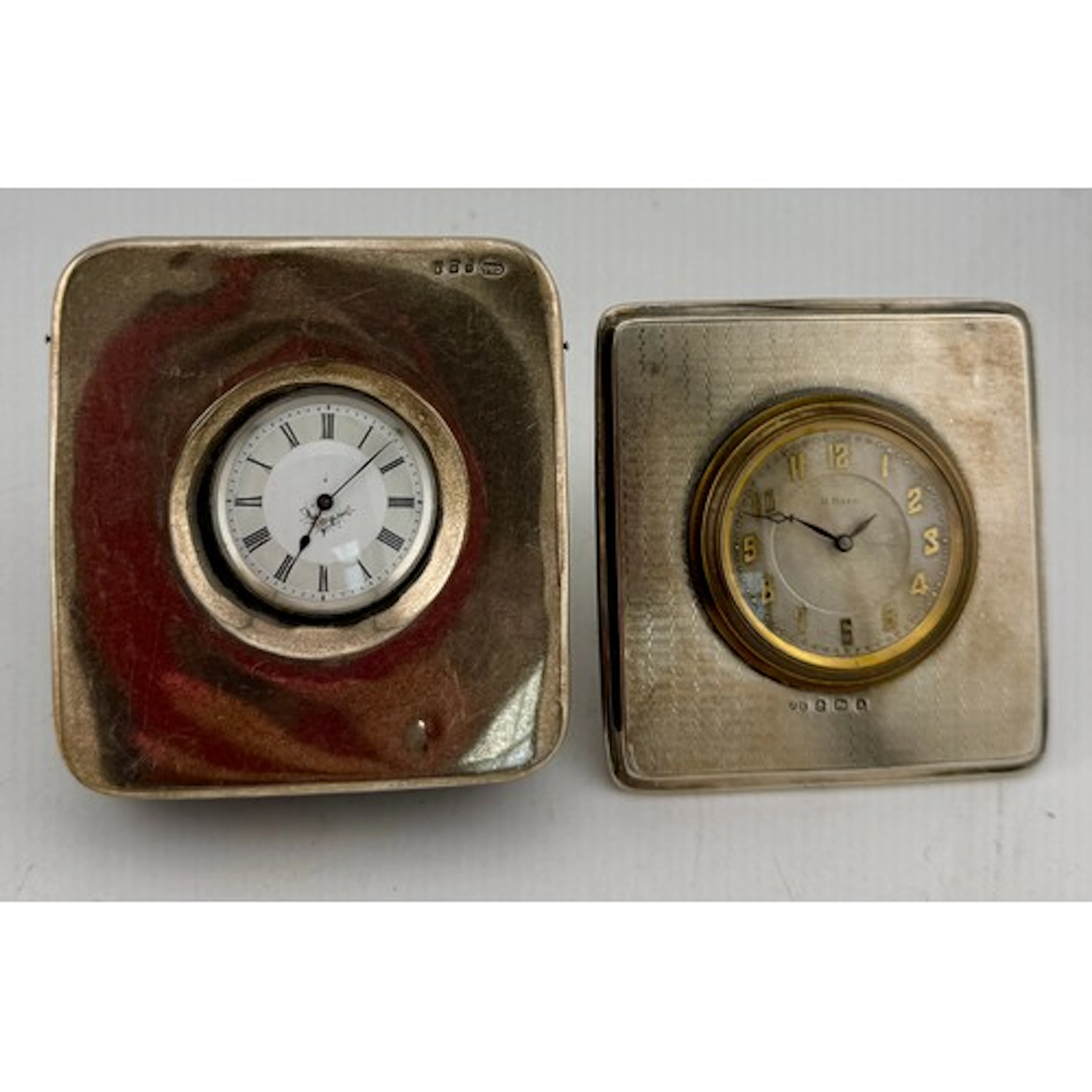 Hallmarked silver watch cases, one containing a continental ...