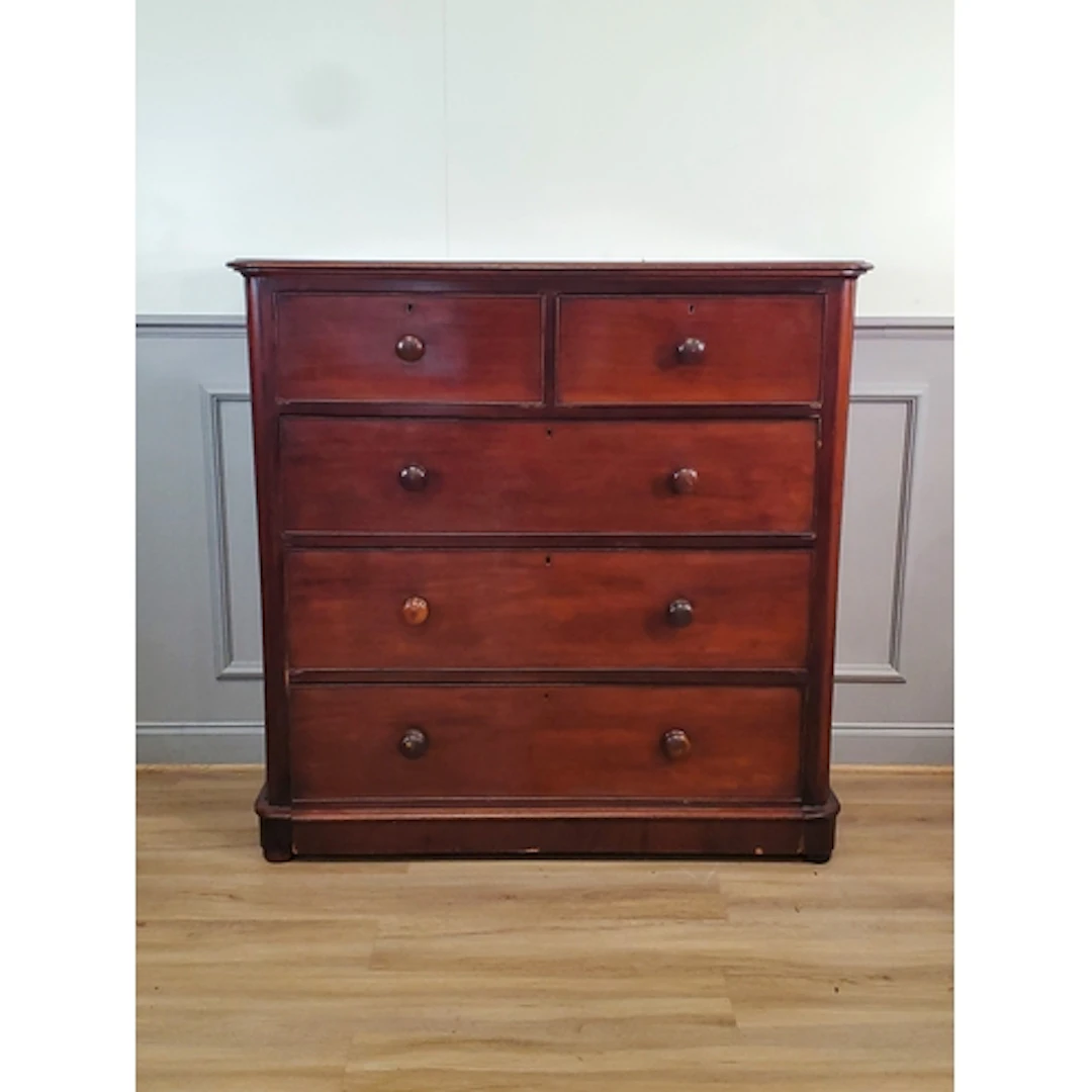 A mahogany Chest of Drawers fitted two short over three long...