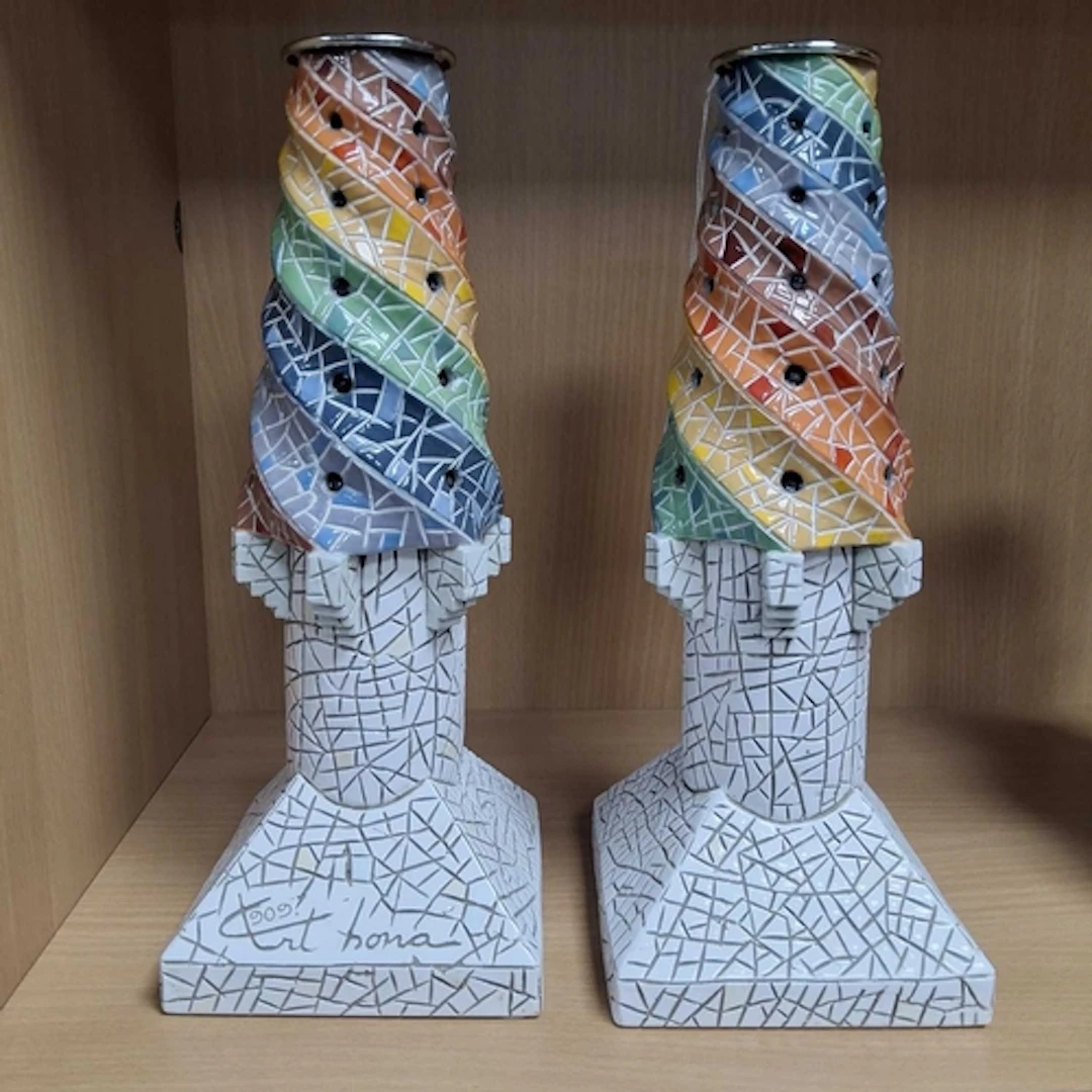 A PAIR OF ARTBONA MOSAIC CANDLESTICK HOLDERS, comprising lim...