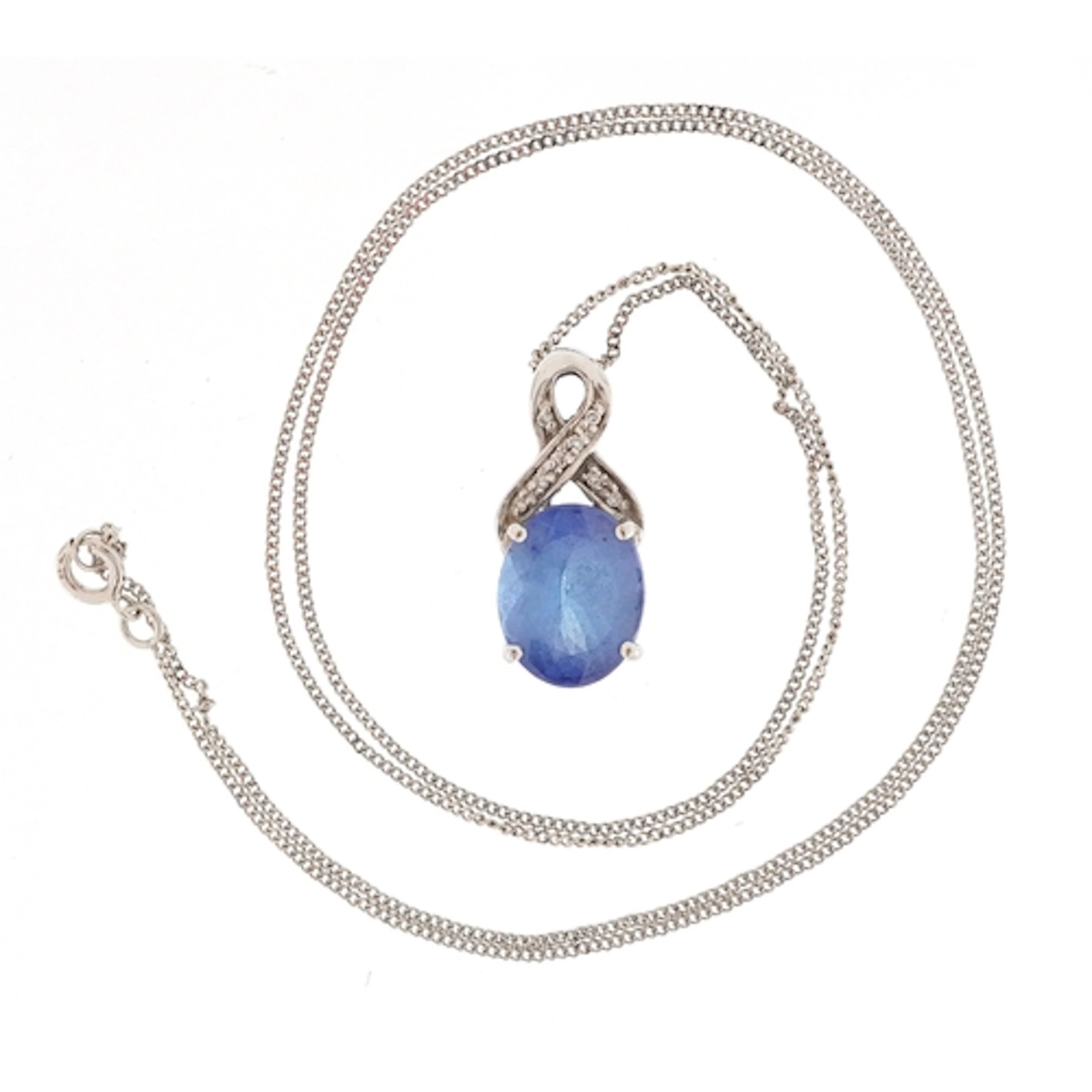 9ct white gold blue stone diamond pendant on a 9ct white gol...