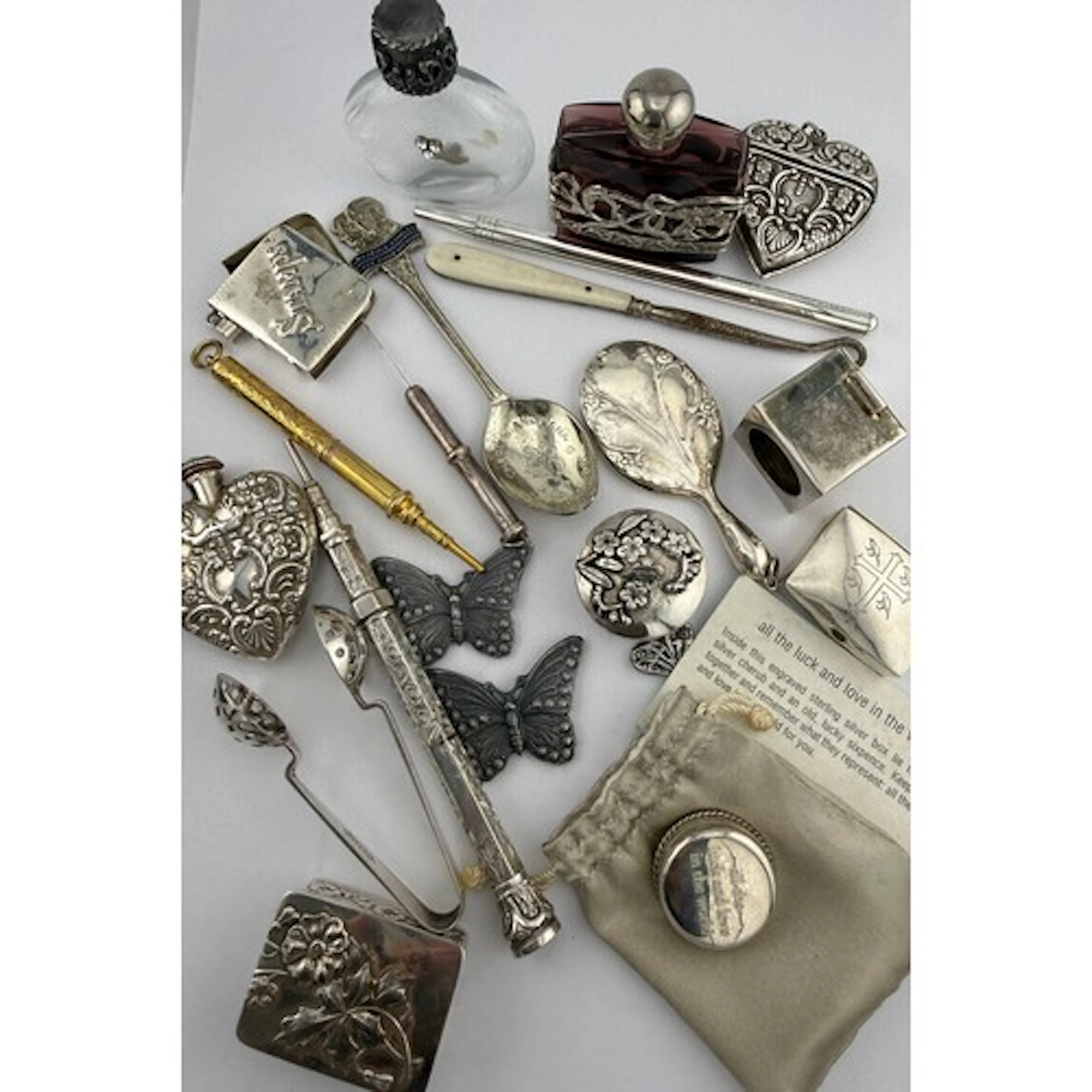 A collection of sterling silver and plated items to include ...