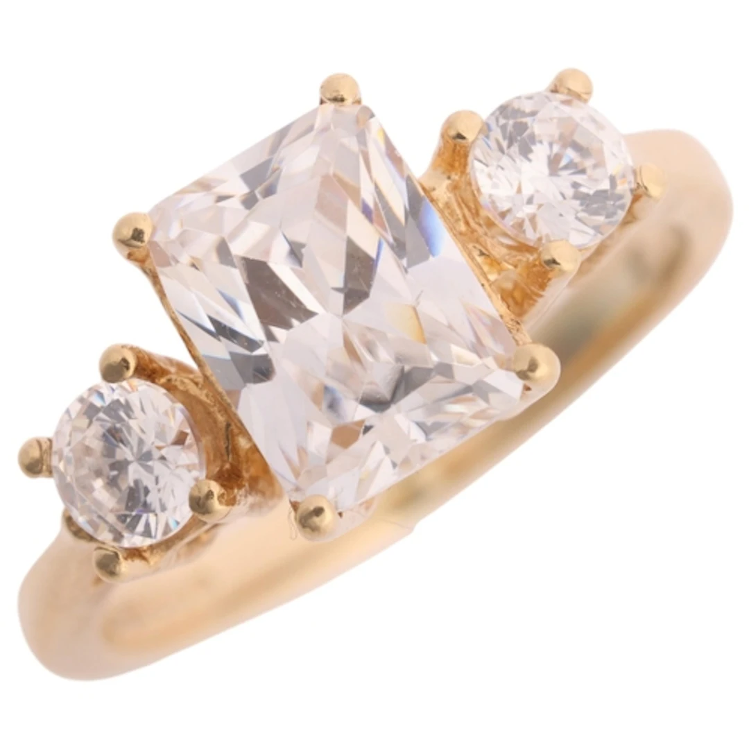 A 9ct gold three stone cubic zirconia ring, maker COS, Sheff...