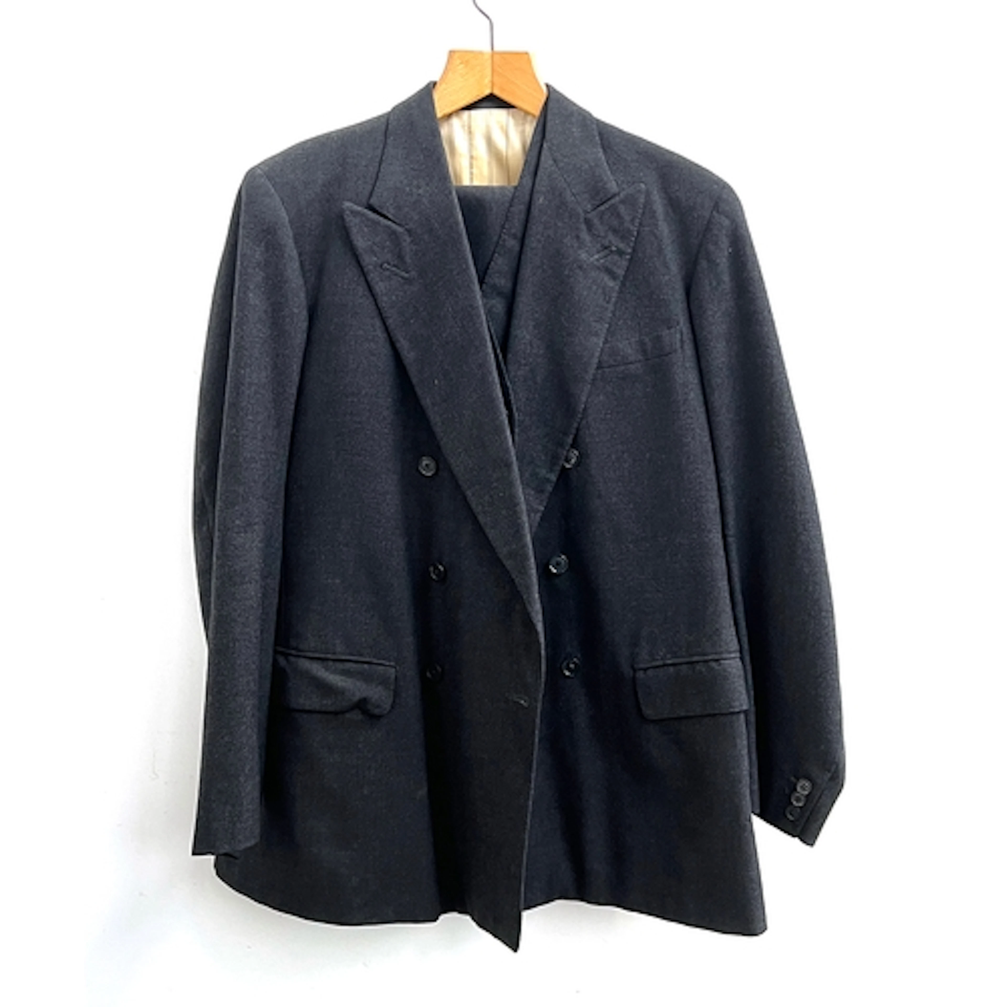 A gents double breasted grey flannel suit tailored by Keogh,...