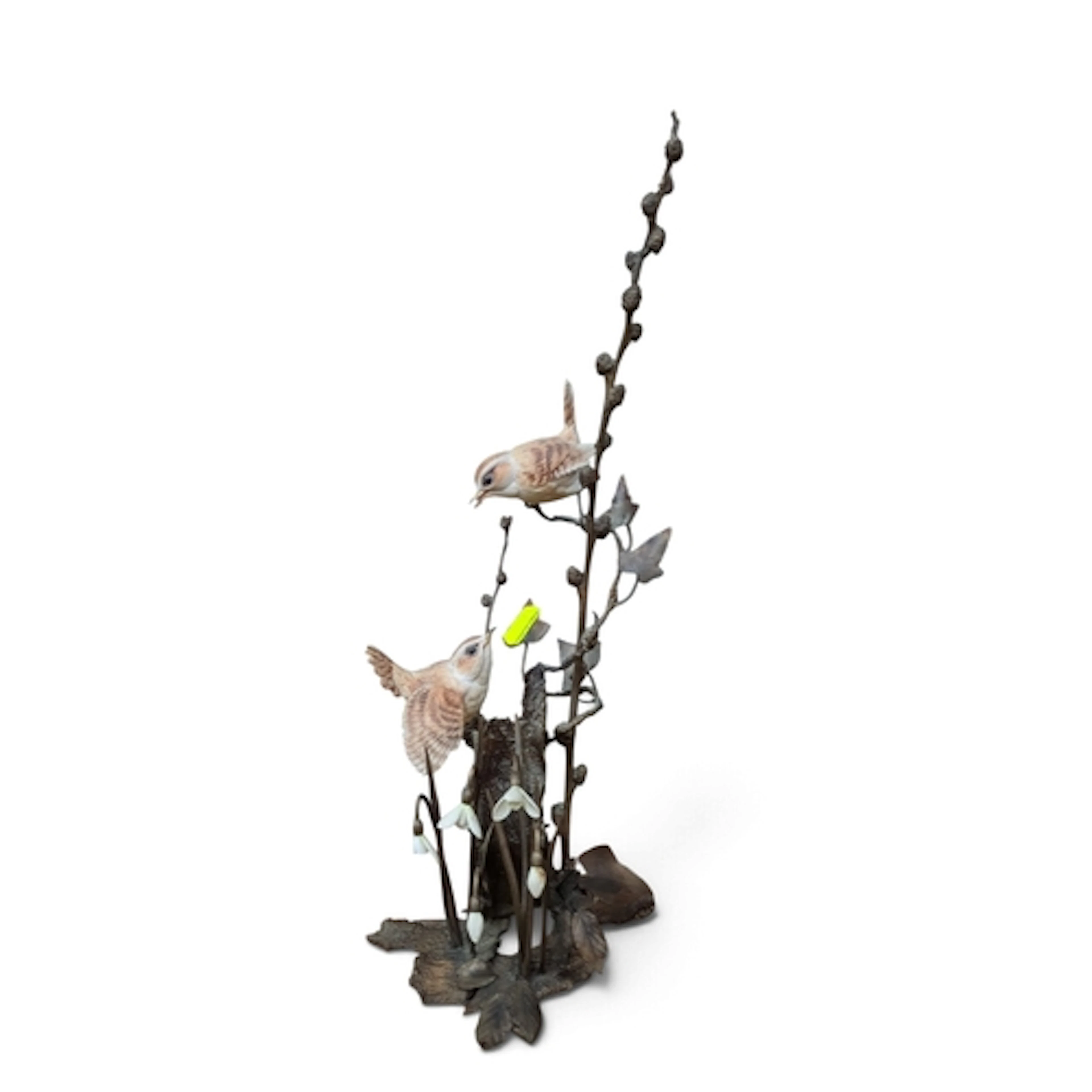 A naturalistic sculptural group of two painted birds among s...