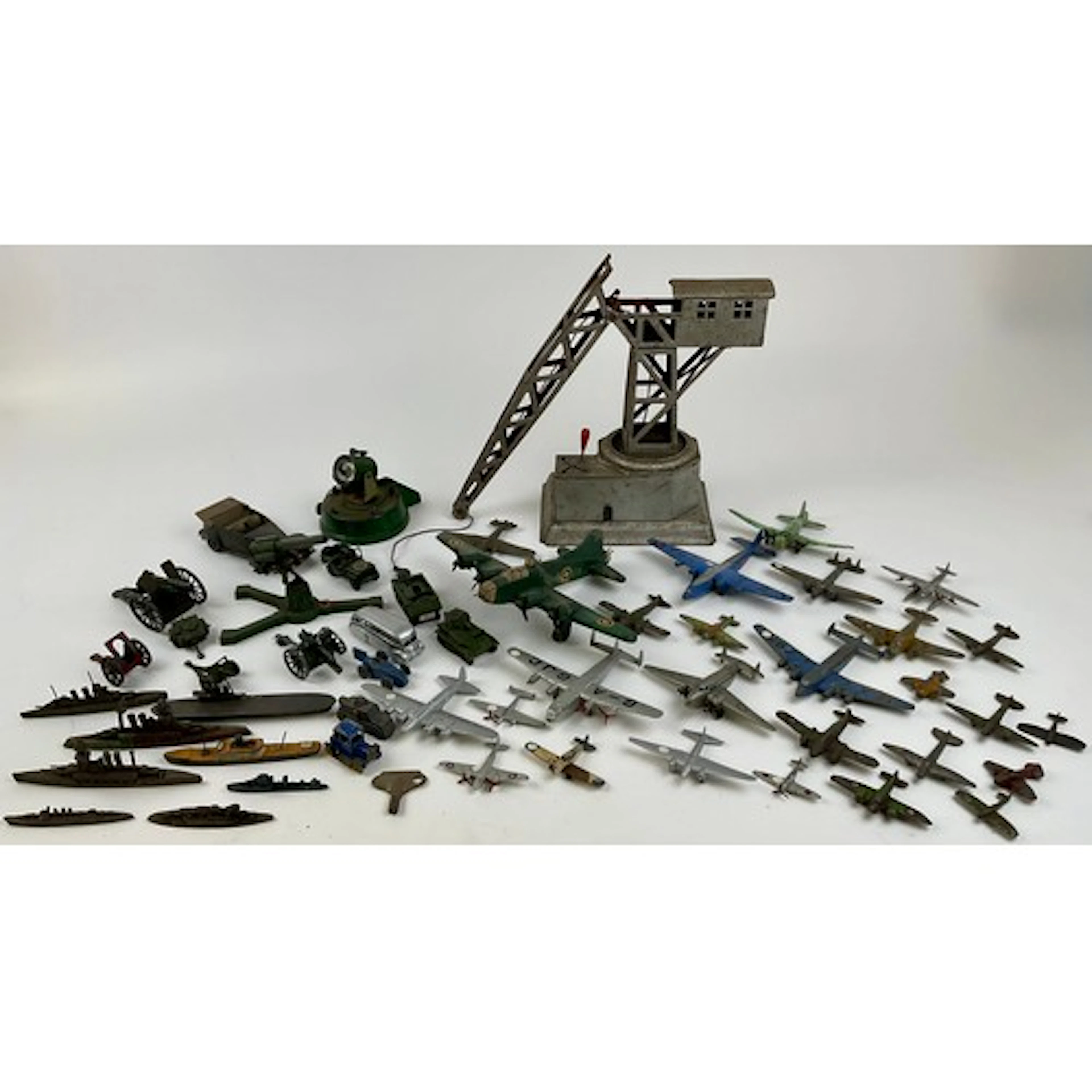 A large 1950’s Georg Levy tinplate clockwork tower slewing j...