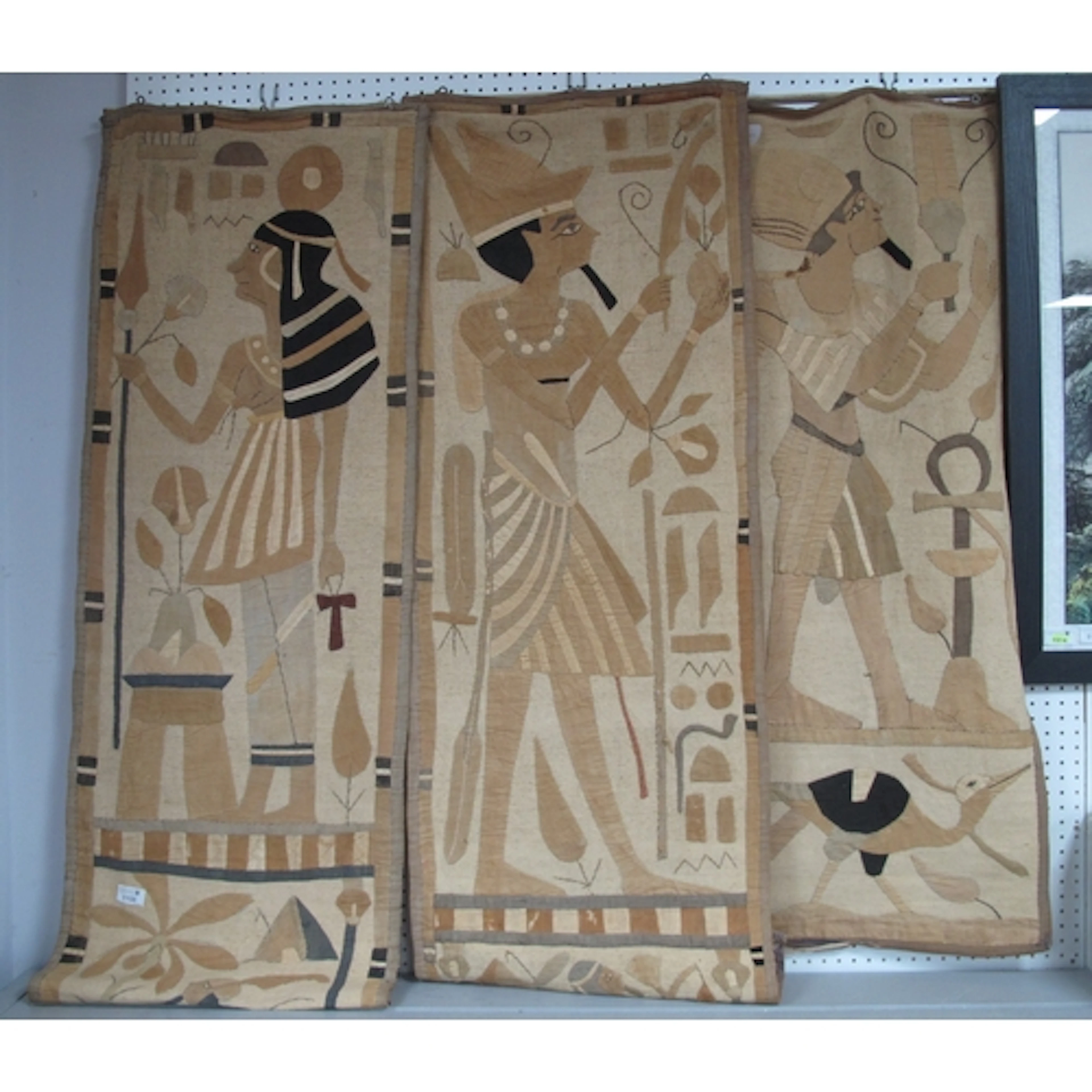 Three Vintage Egyptian Wall Hangings in various fabrics on h...