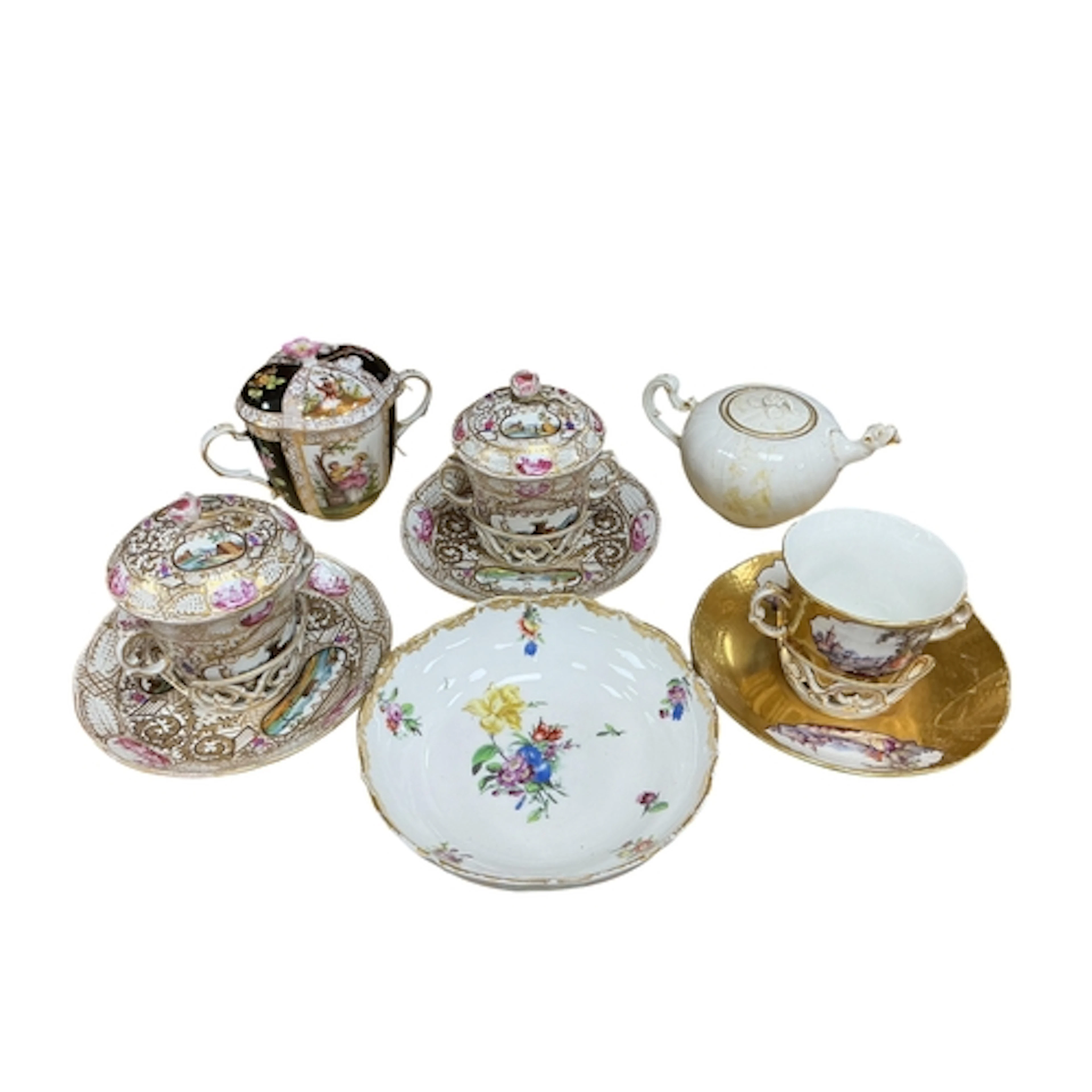 A pair of 19th century Berlin porcelain chocolate cups, cove...