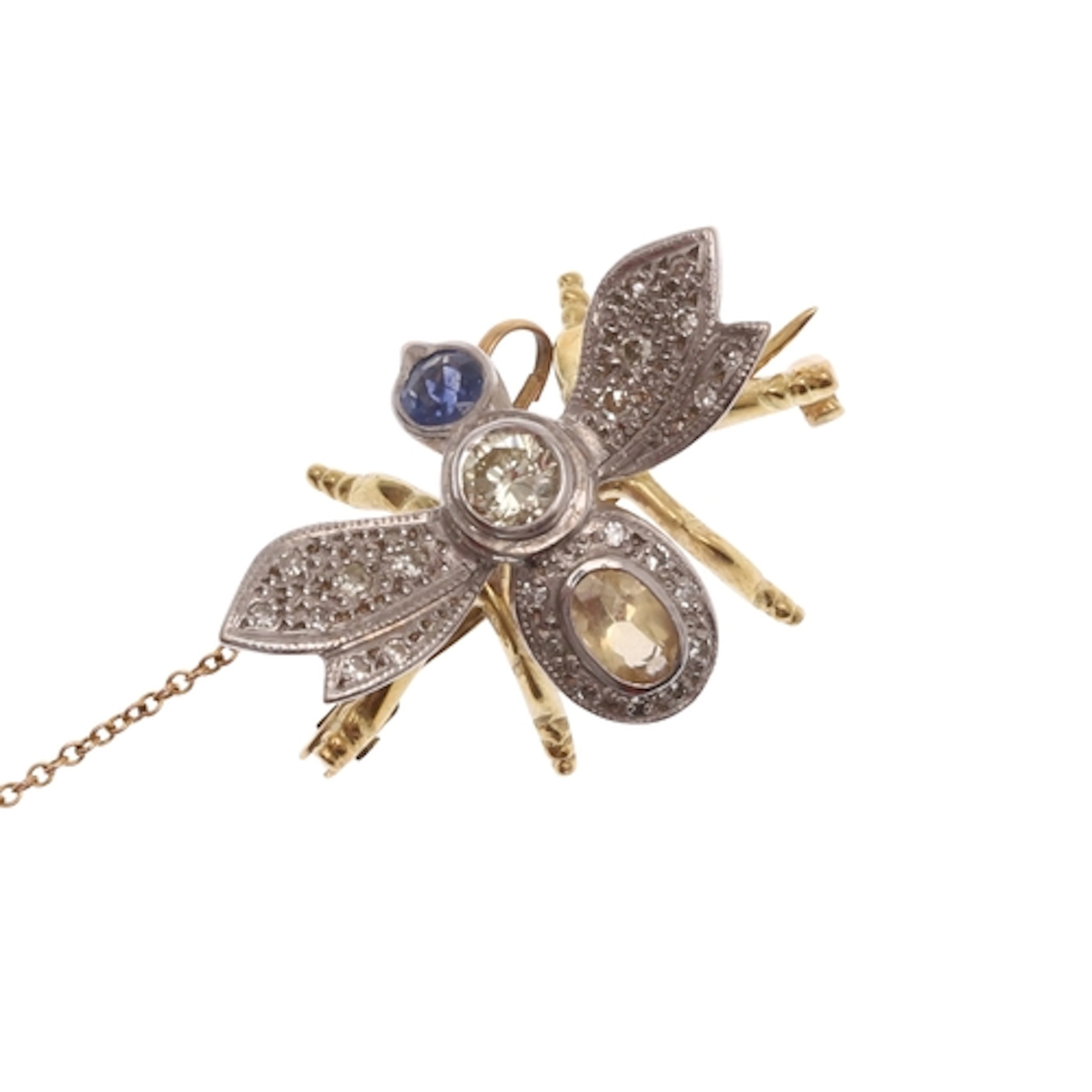 A GEM SET INSECT BROOCH. the body is mounted with a circular...