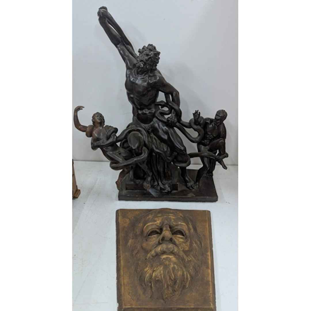 A resin sculpture after Laocoön and His Sons, bronzed colour...