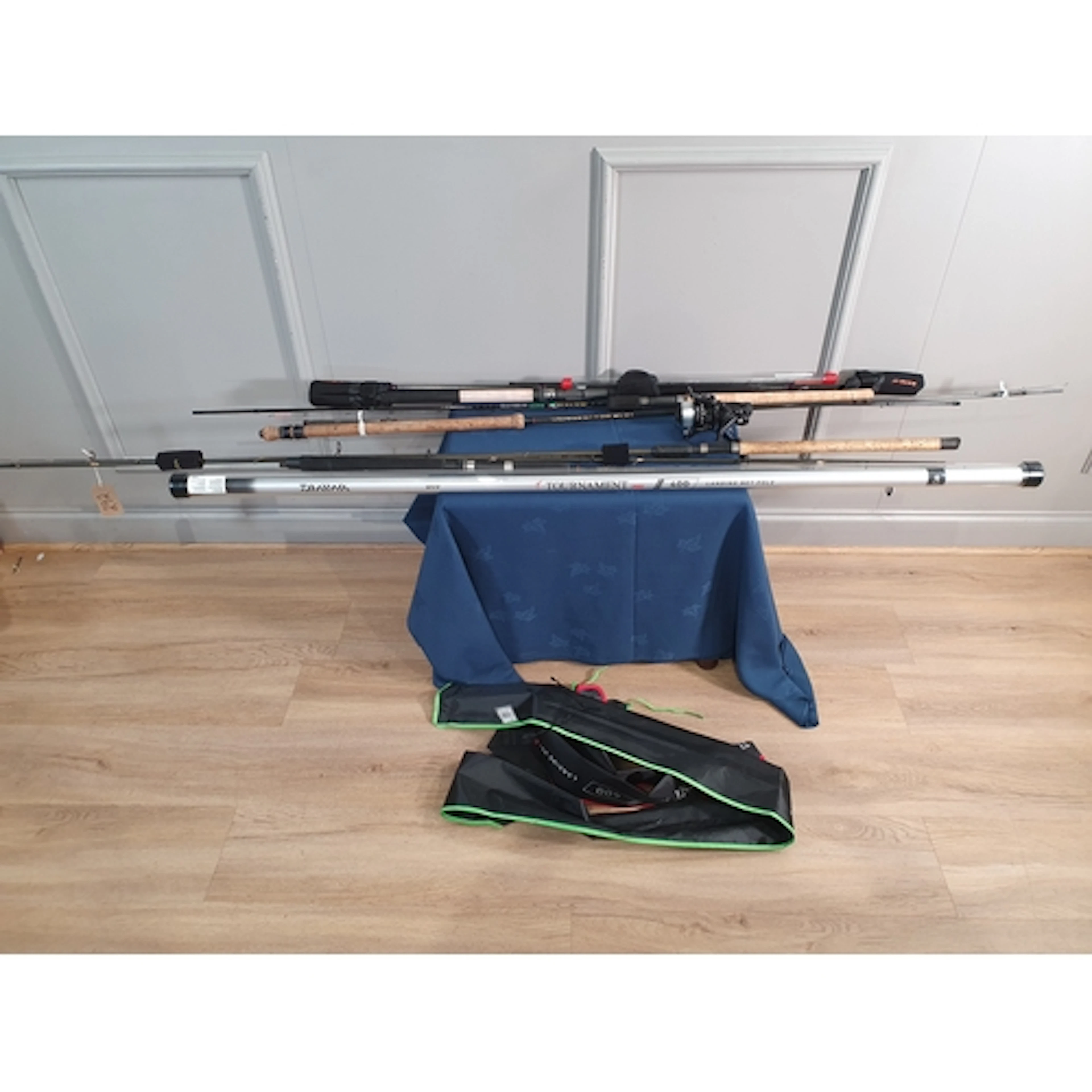 A quantity of Fishing Rods to include a Maver Specialist 360...