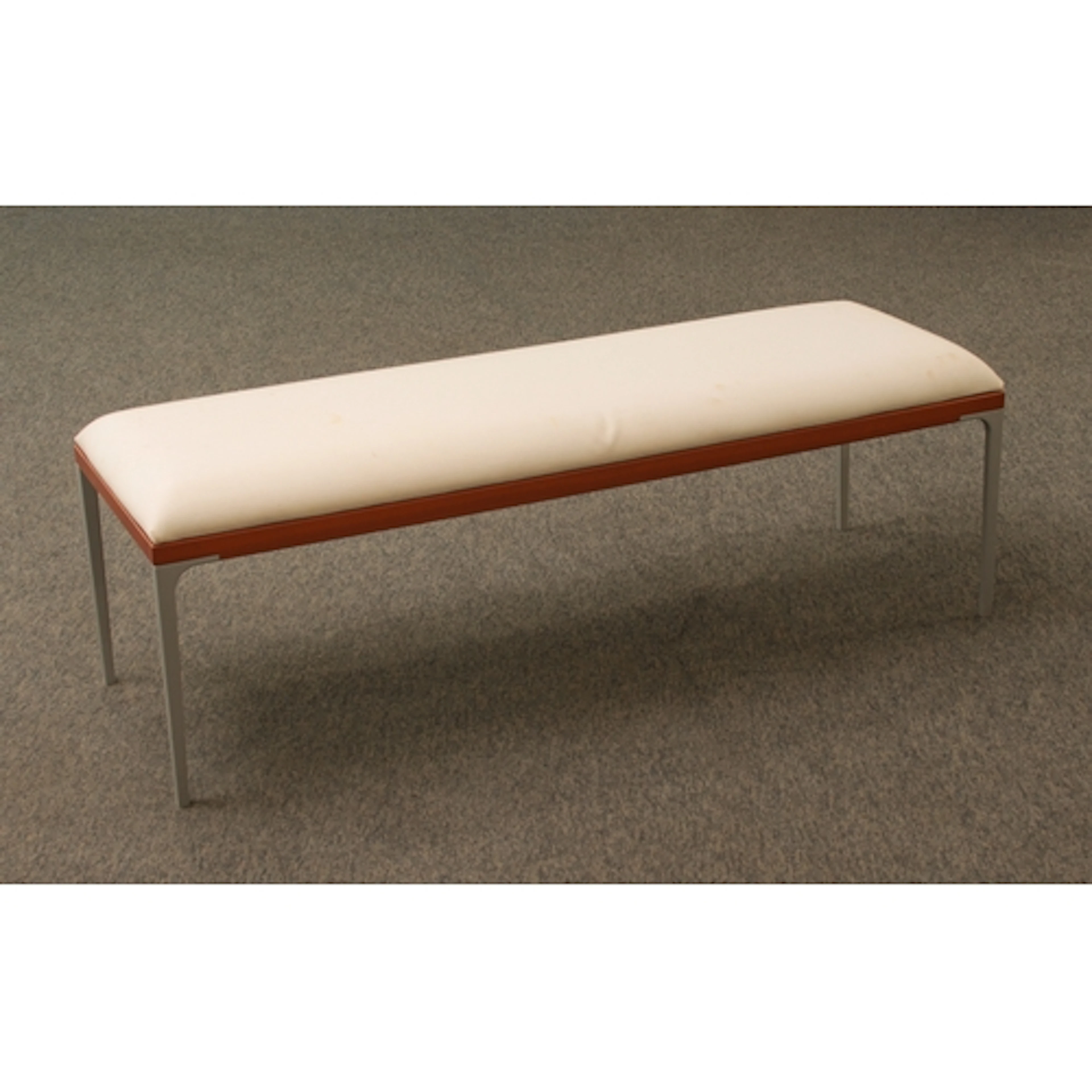 A Cassina long upholstered bedroom stool - probably from the...