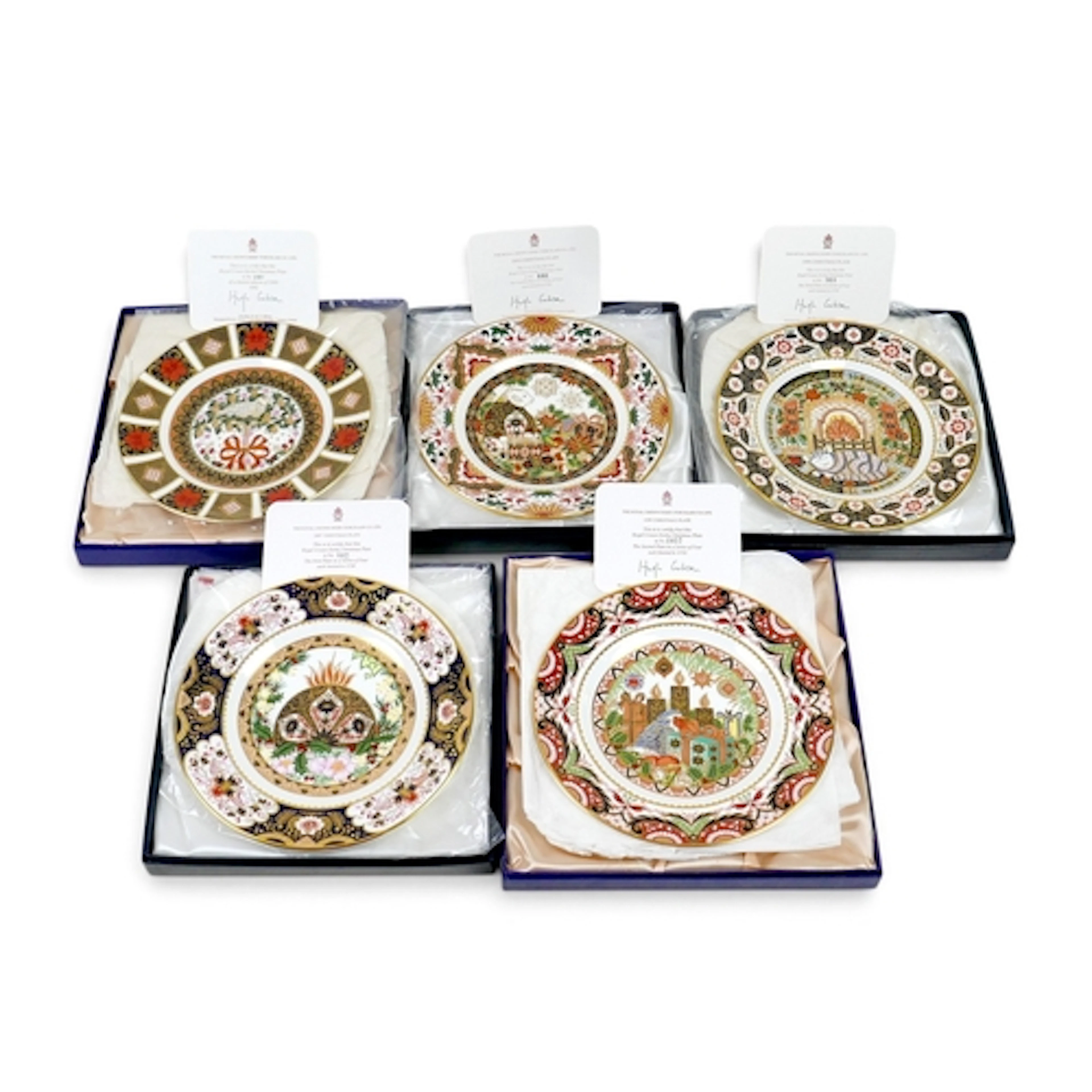 FIVE ROYAL CROWN DERBY CHRISTMAS PLATES. all with certificat...