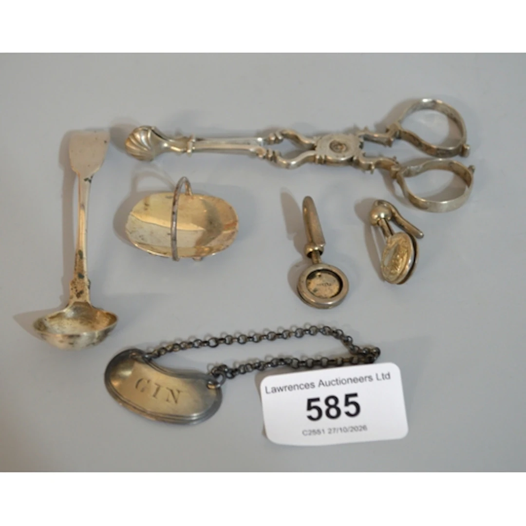 Georgian silver gin label, two silver napkin holders, pair o...