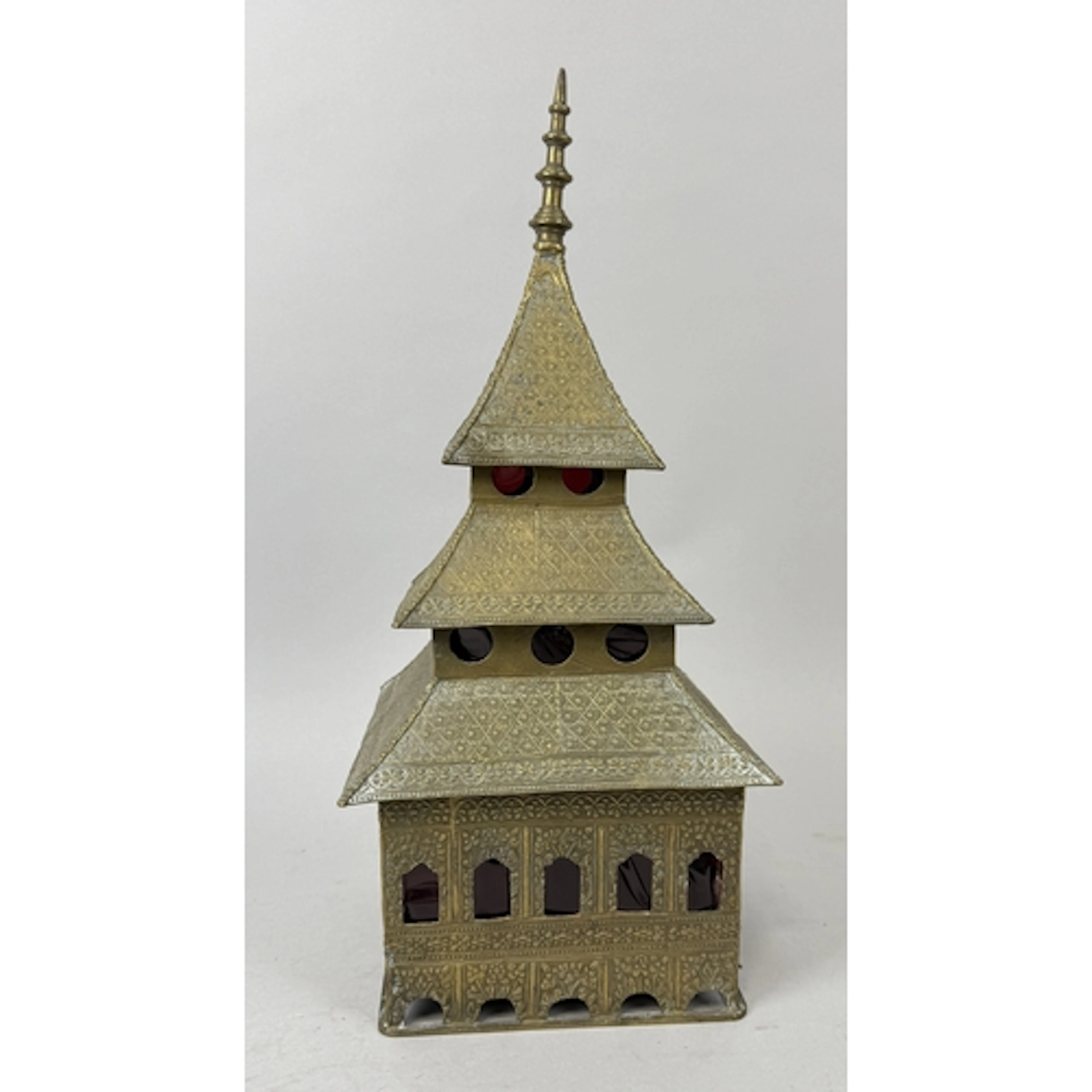 AN INDIAN BRASS PAGODA, IN FOUR SECTIONS Red paper attached ...