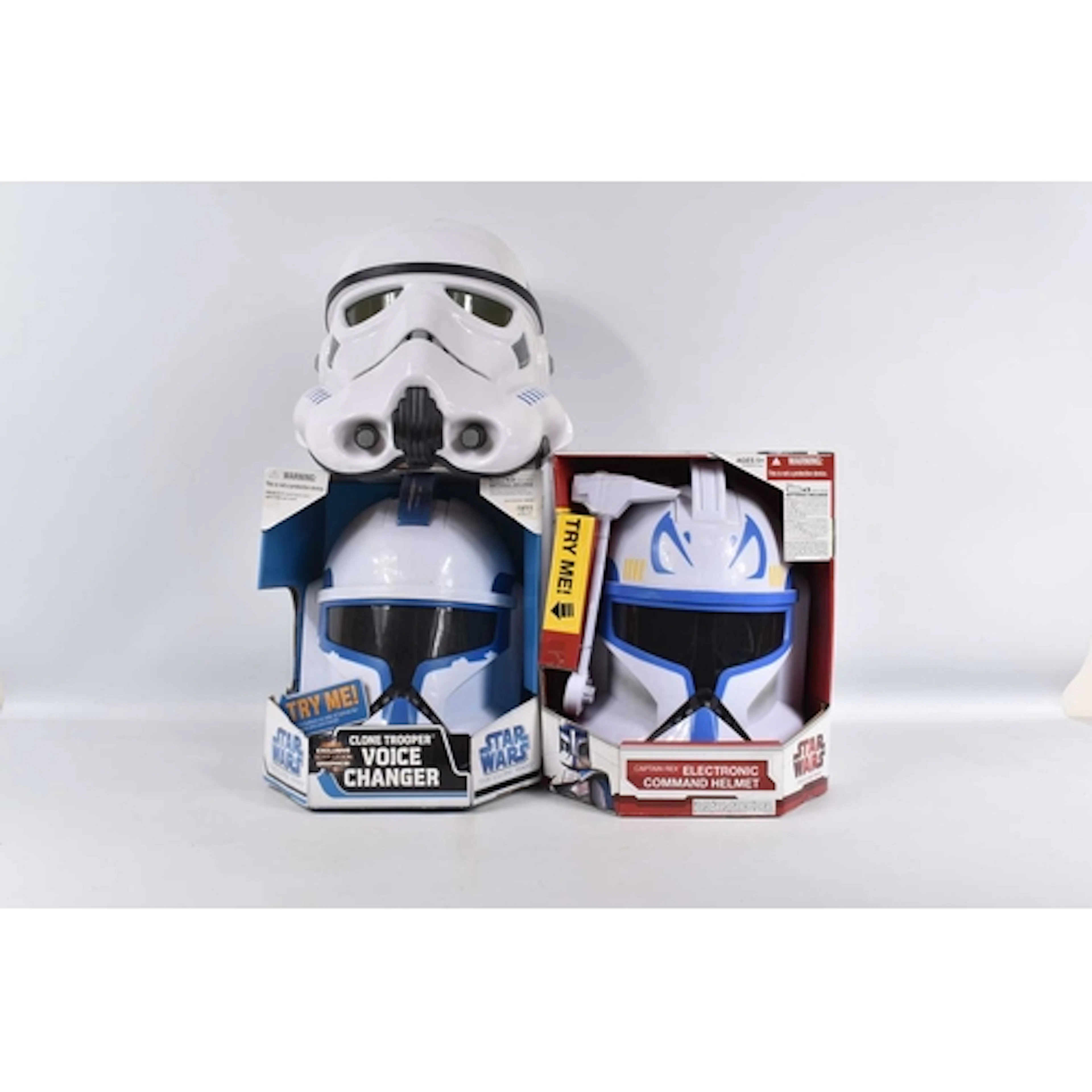 THREE HASBRO STAR WARS ELECTRONIC HELMETS, to include a Boxe...
