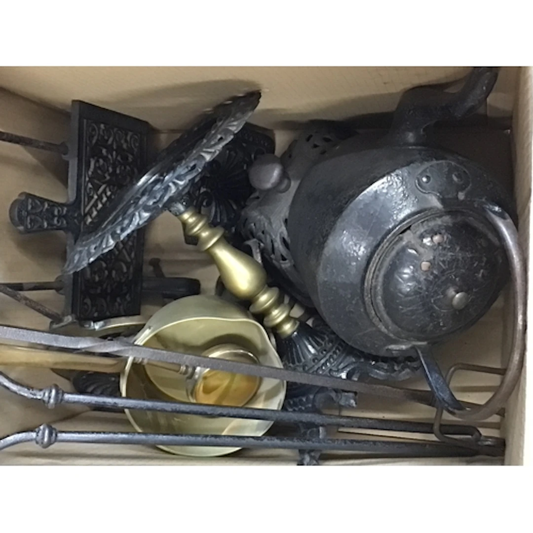 A box containing Victorian cast metal and brass fire compani...