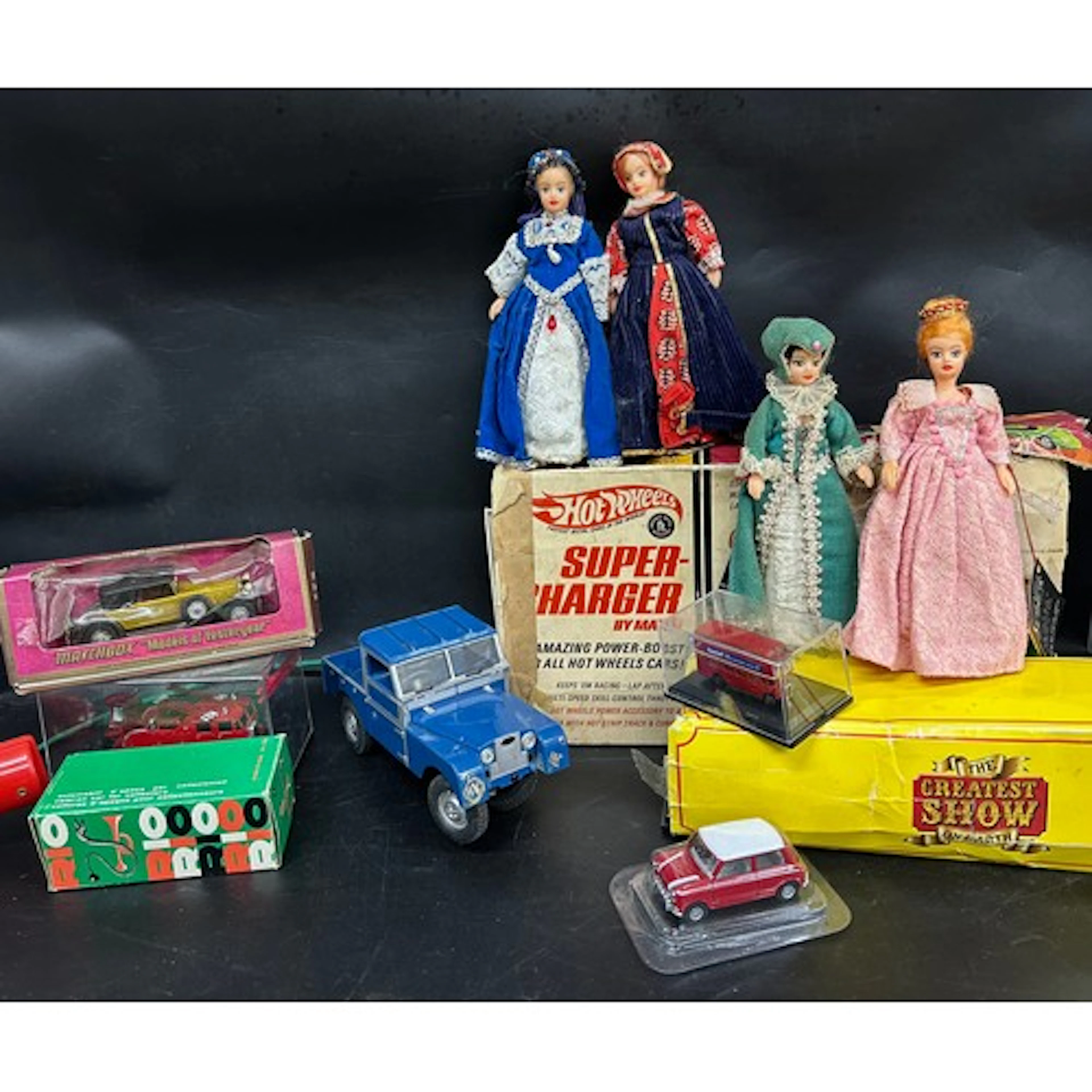 Hot Wheels Supercharger, four Rexard dolls and other toys