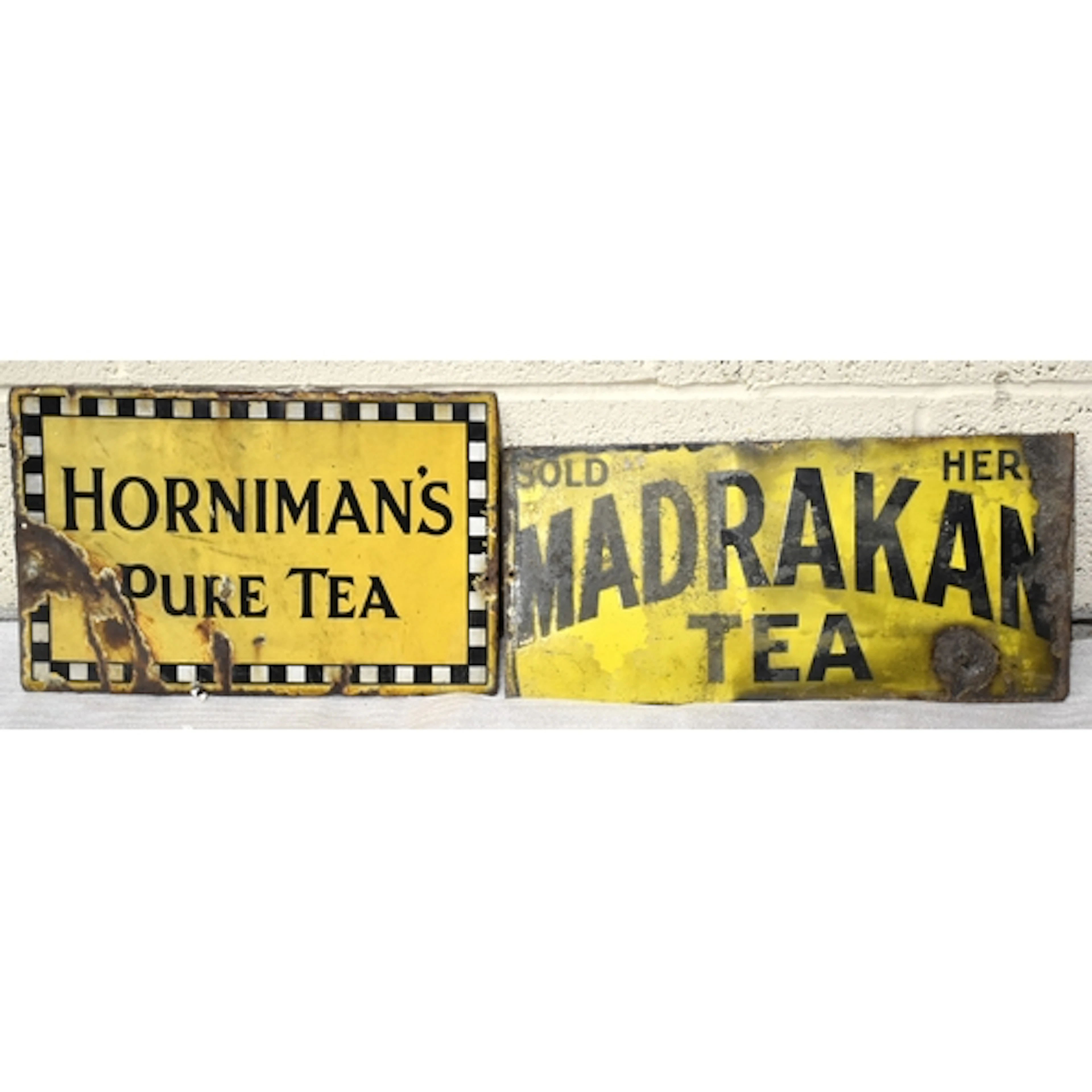Two double-sided enamelled advertising signs: "Horniman's Pu...