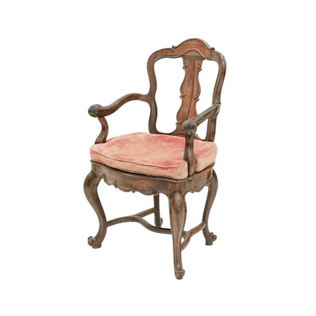 An Anglo Portuguese solid rosewood elbow chair. 18th century...