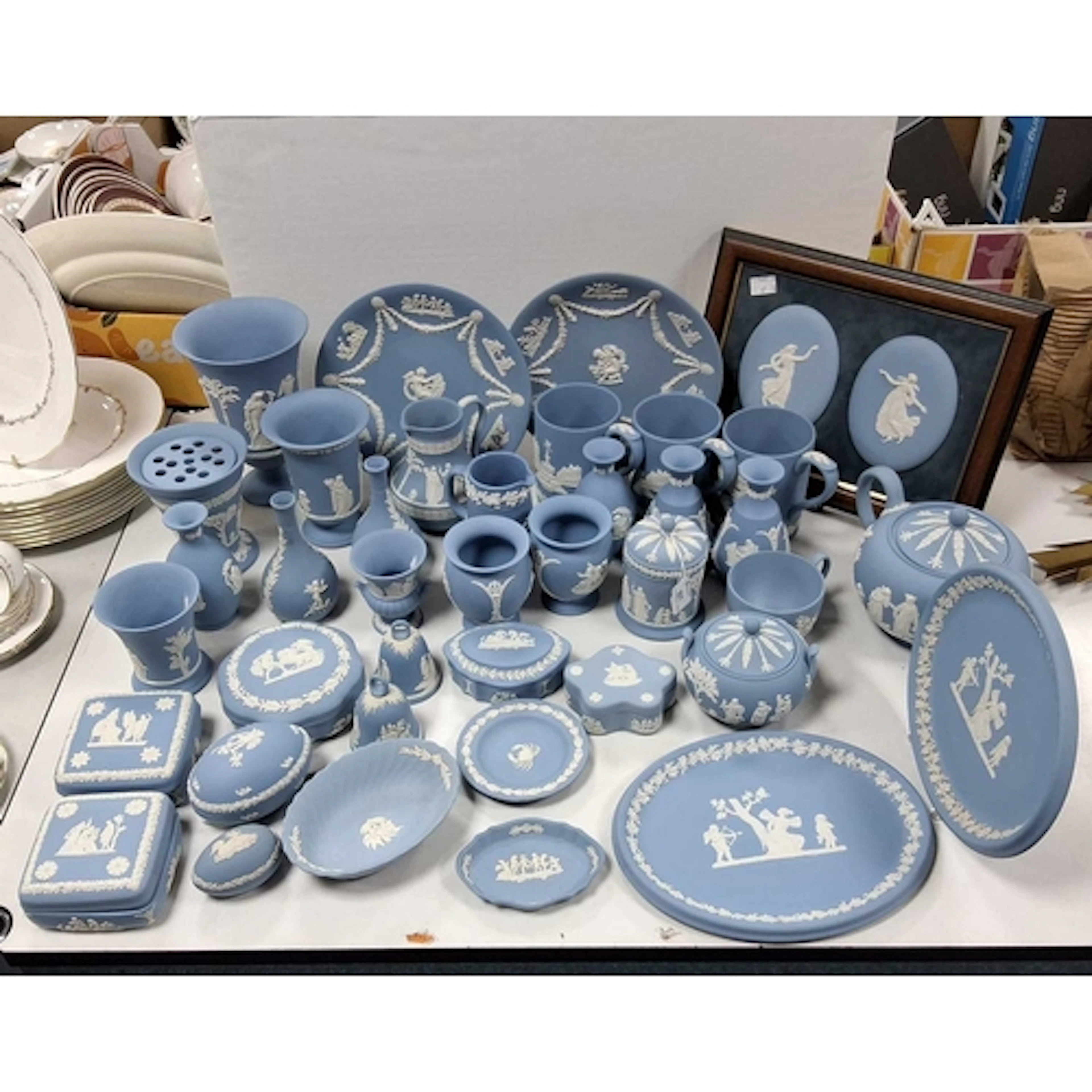 A GROUP OF WEDGWOOD LIGHT BLUE JASPERWARE, to include plates...