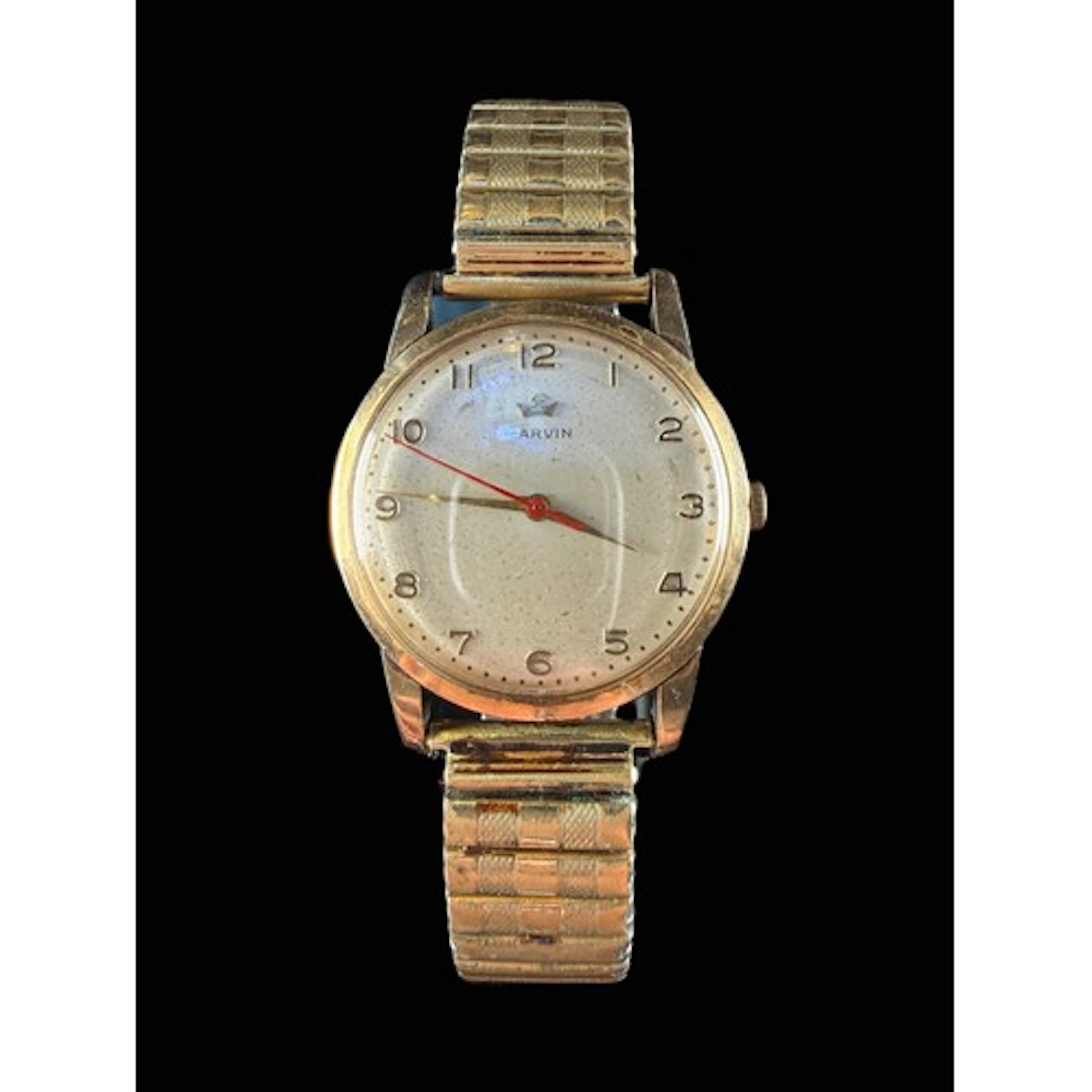 A 9ct gold backed gents Marvin vintage watch.