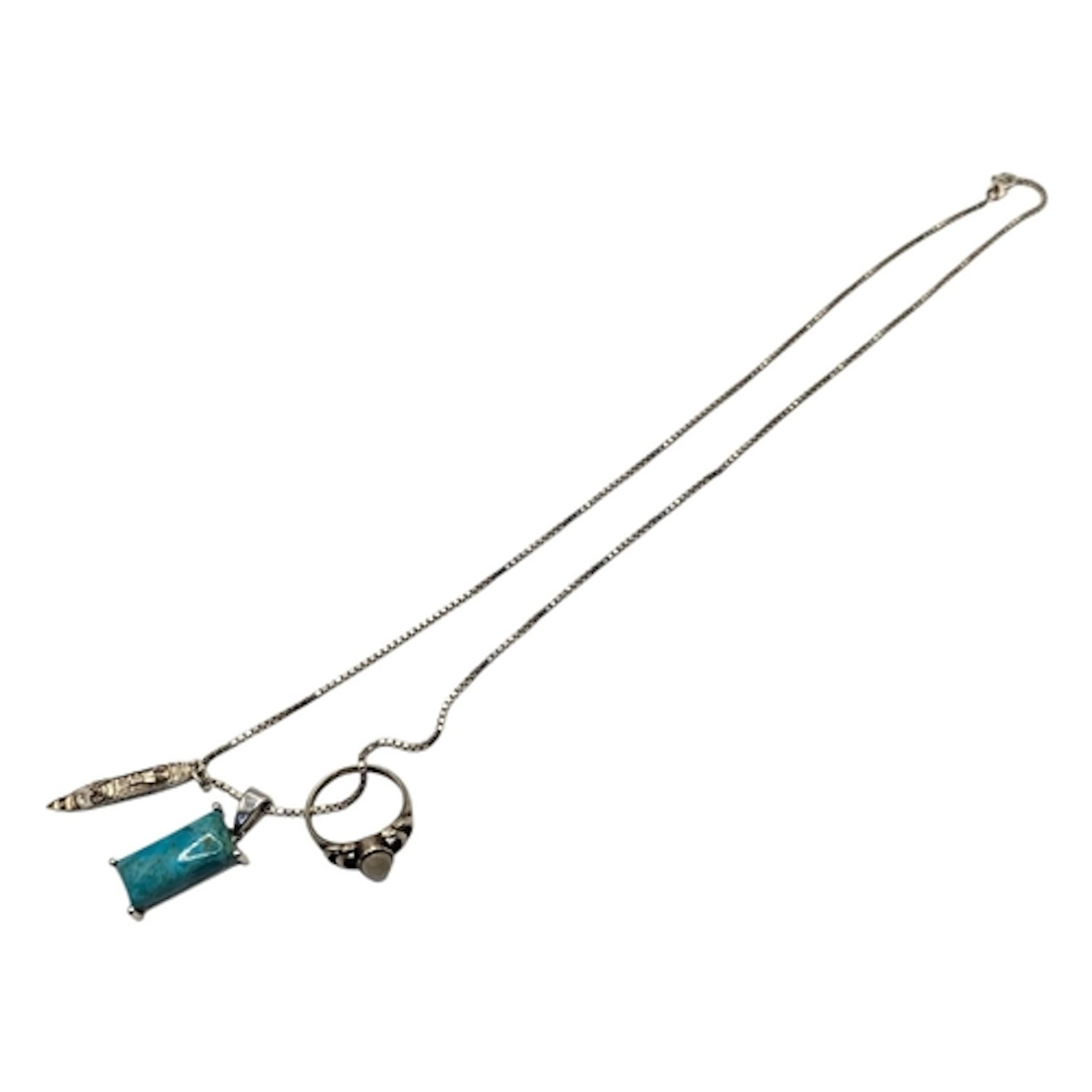 A VINTAGE SILVER AND TURQUOISE PENDANT NECKLACE Rectangular ...