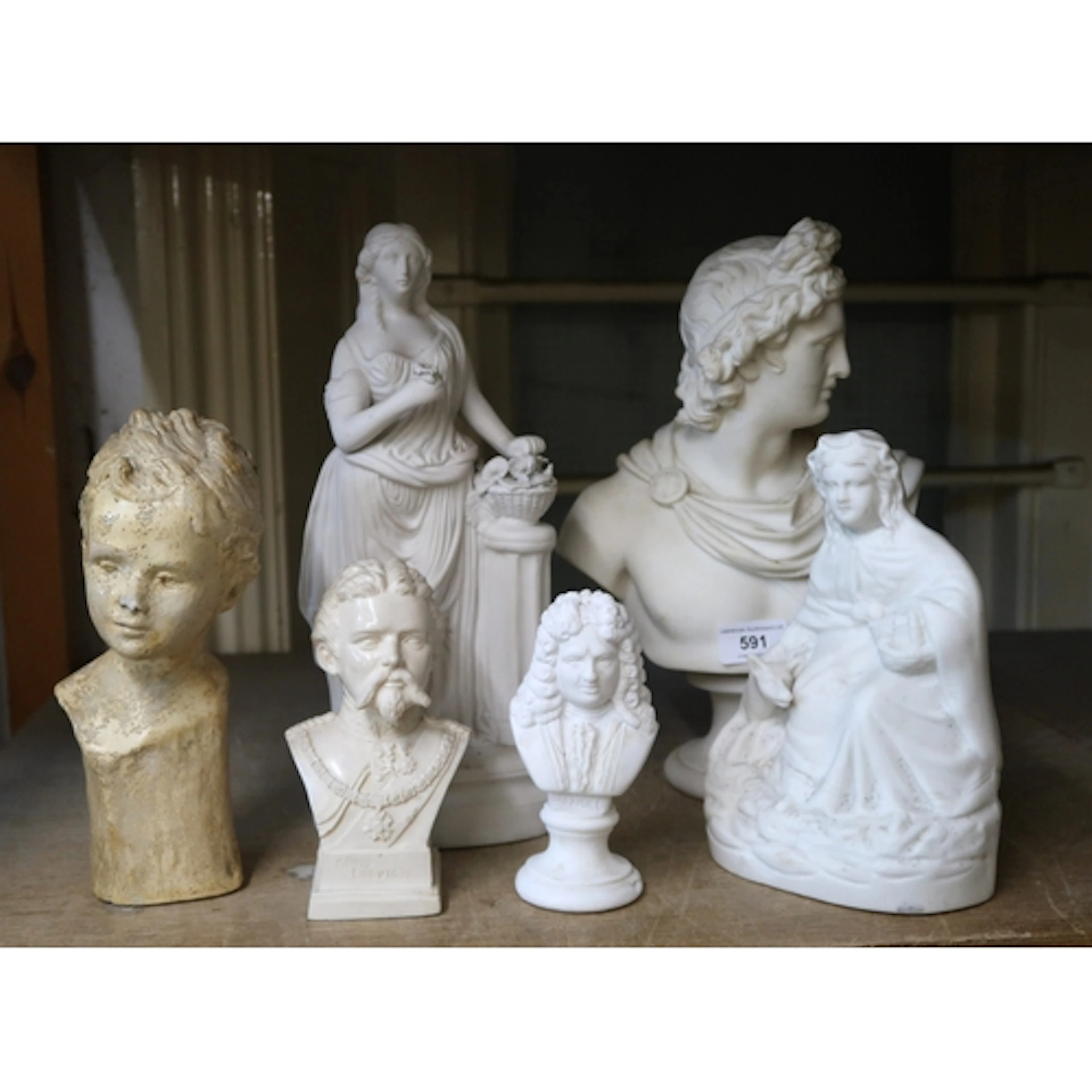 White Parian bust of Apollo, together with other Parian and ...
