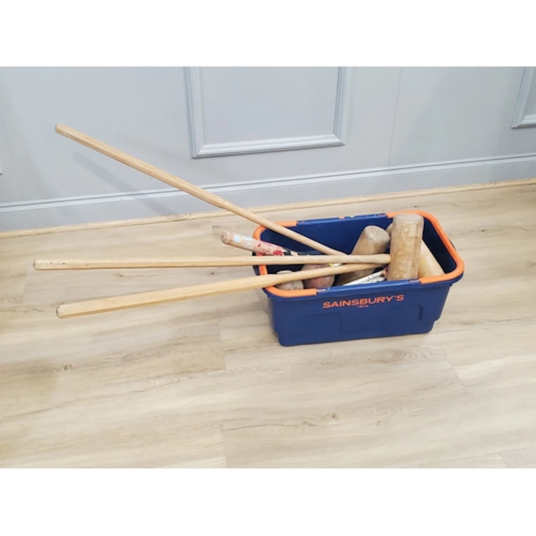 A box containing a quantity of Croquet equipment, (R2).