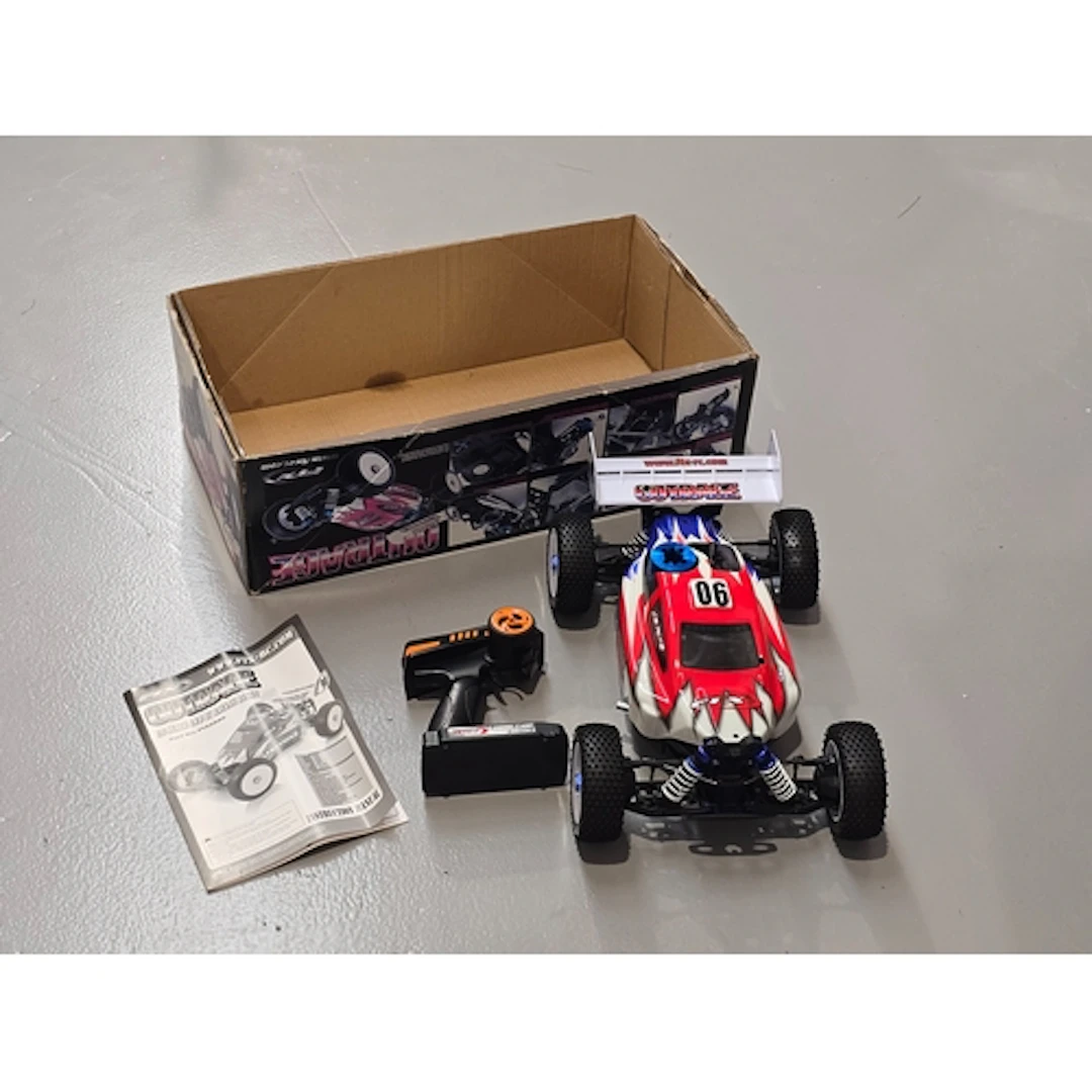 FTX Outrage 1/8 Scale 4WD IC radio controlled racing buggy. ...