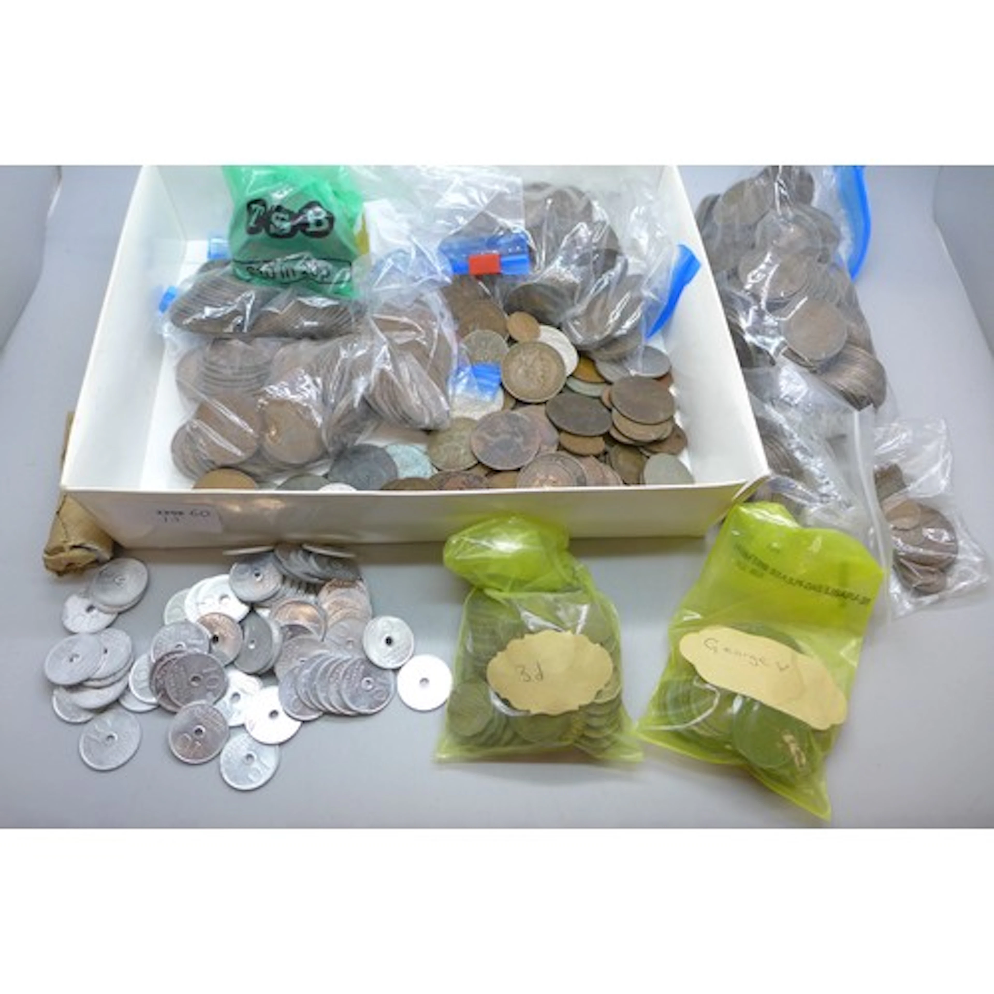 A collection of coins including George V, George VI, Nationa...