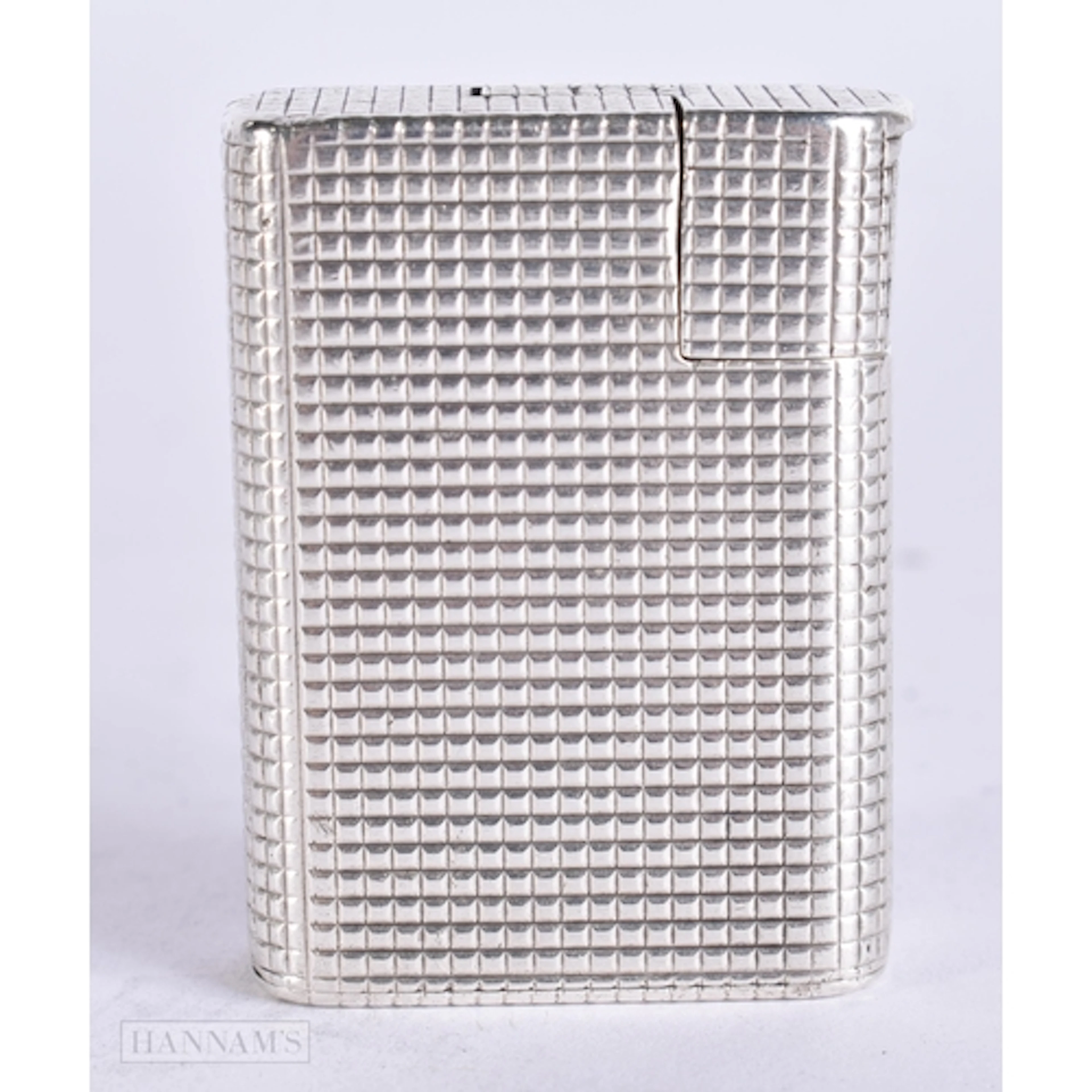 AN ART DECO FRENCH HERMES SILVER LIGHTER. 4.5 cm high.