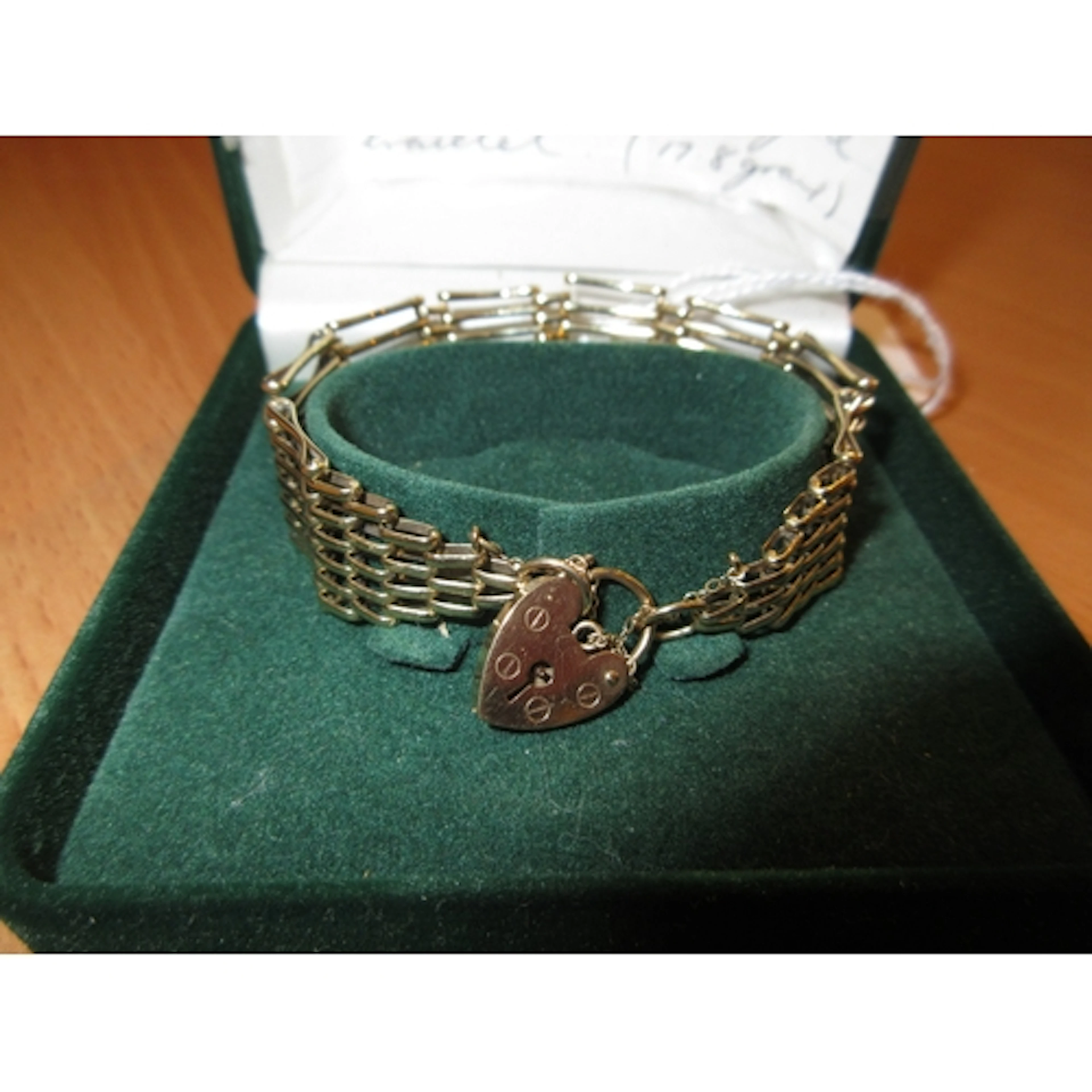 9ct Gold 7 Bar Gate Bracelet, with jeweller's receipt, 17.8g