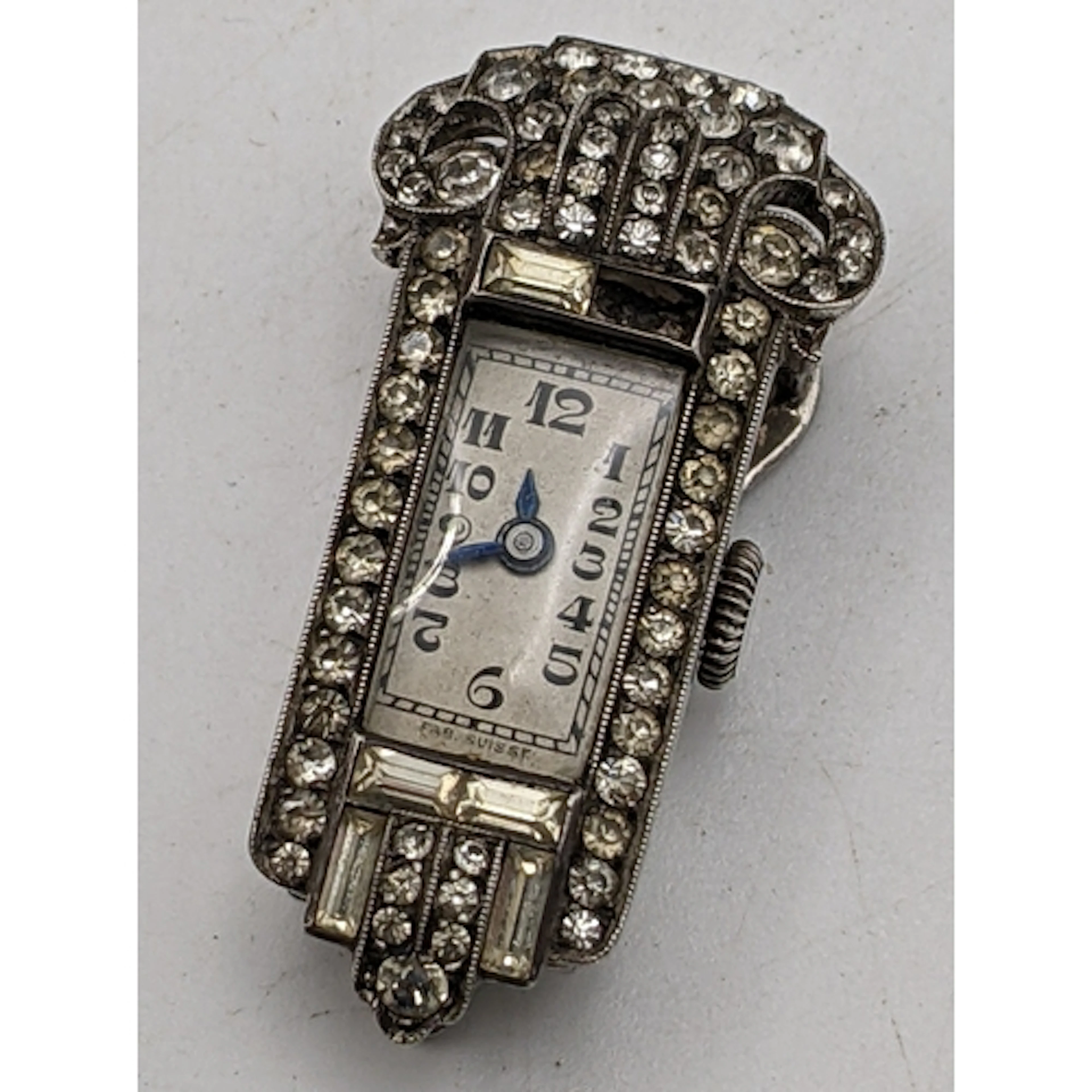 An Art Deco silver and paste set nurses Tapel clip/brooch wa...