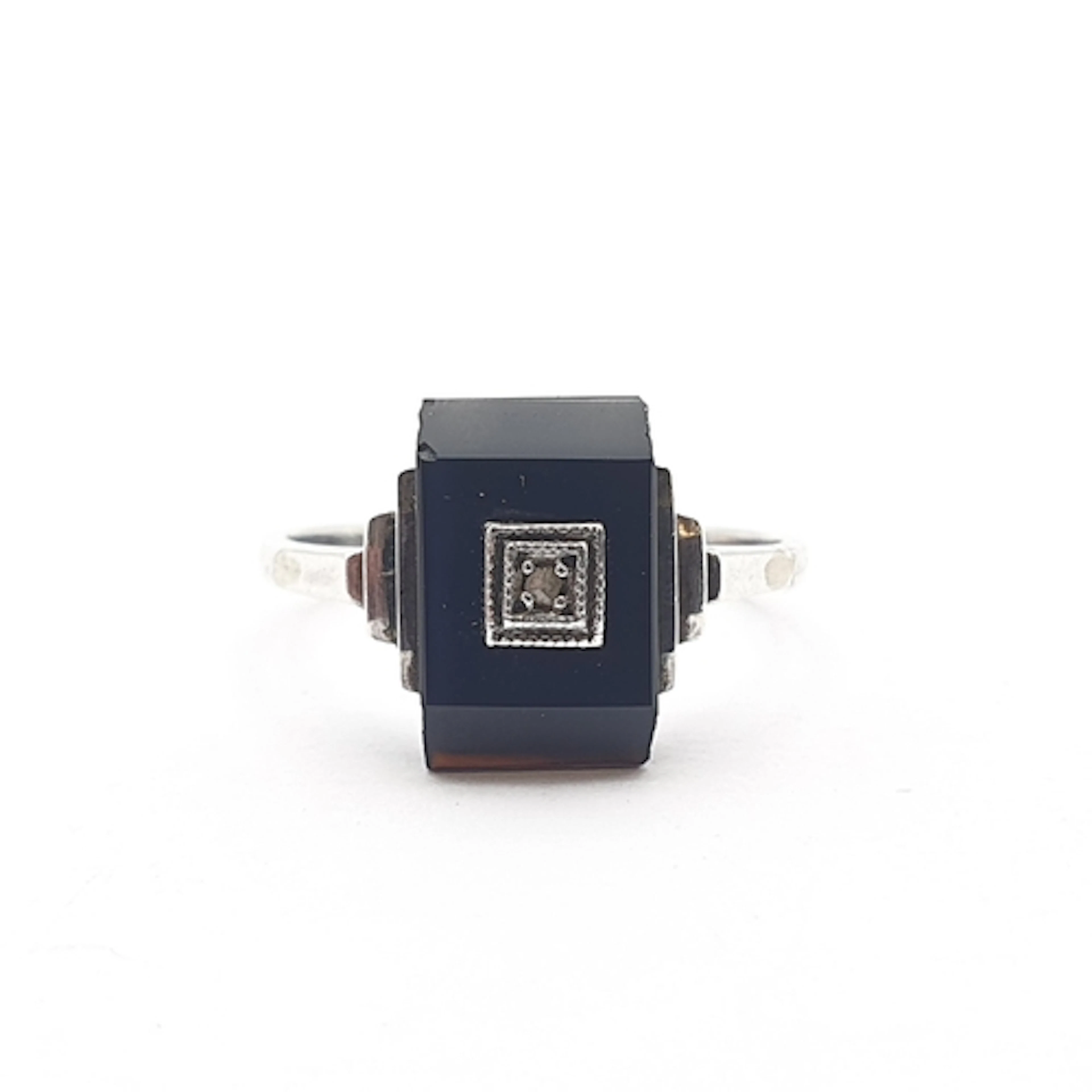 A continental Art Deco Mourning Ring, onyx plaque set tiny d...