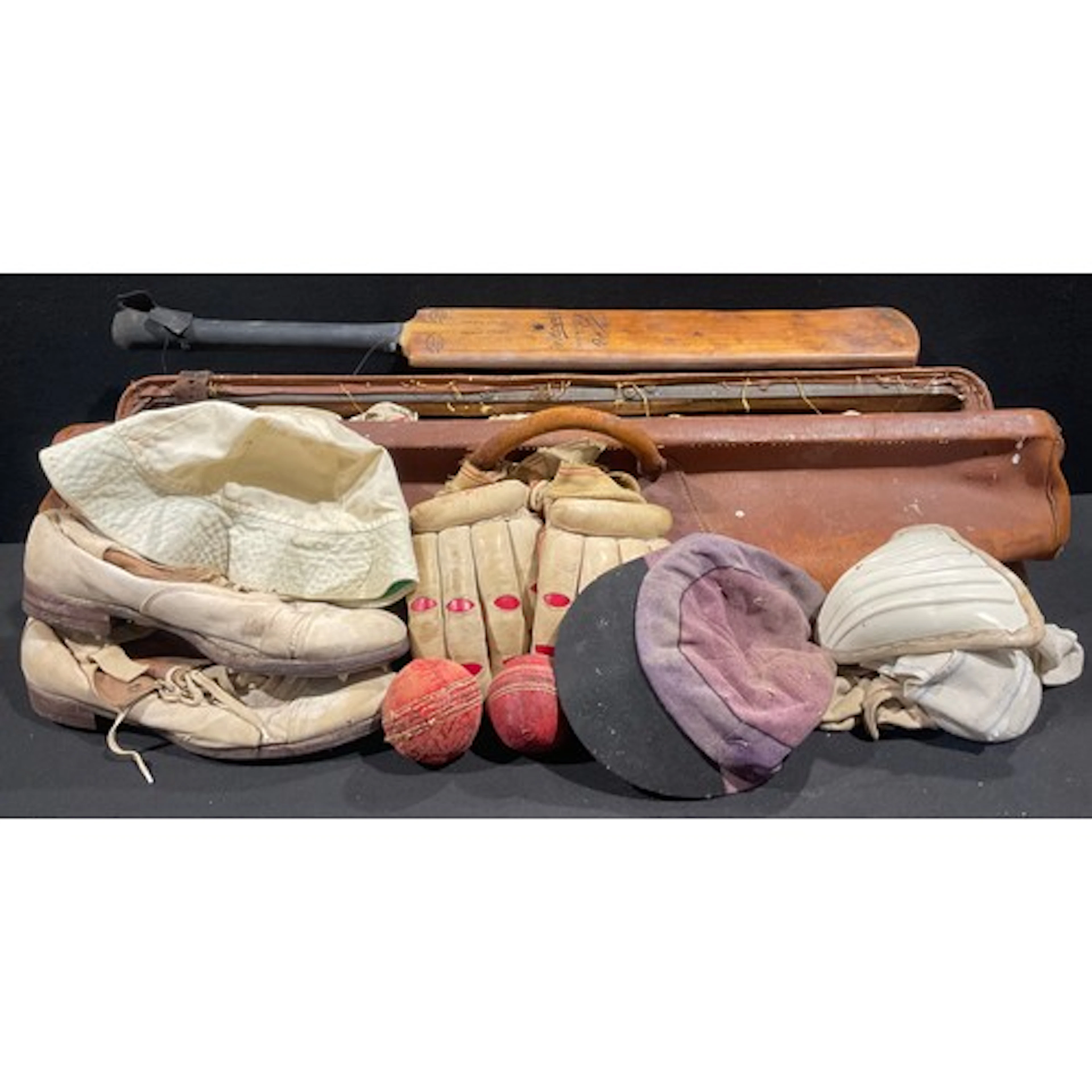 Sports - a cricket batsmen’s leather kit bag with contents, ...