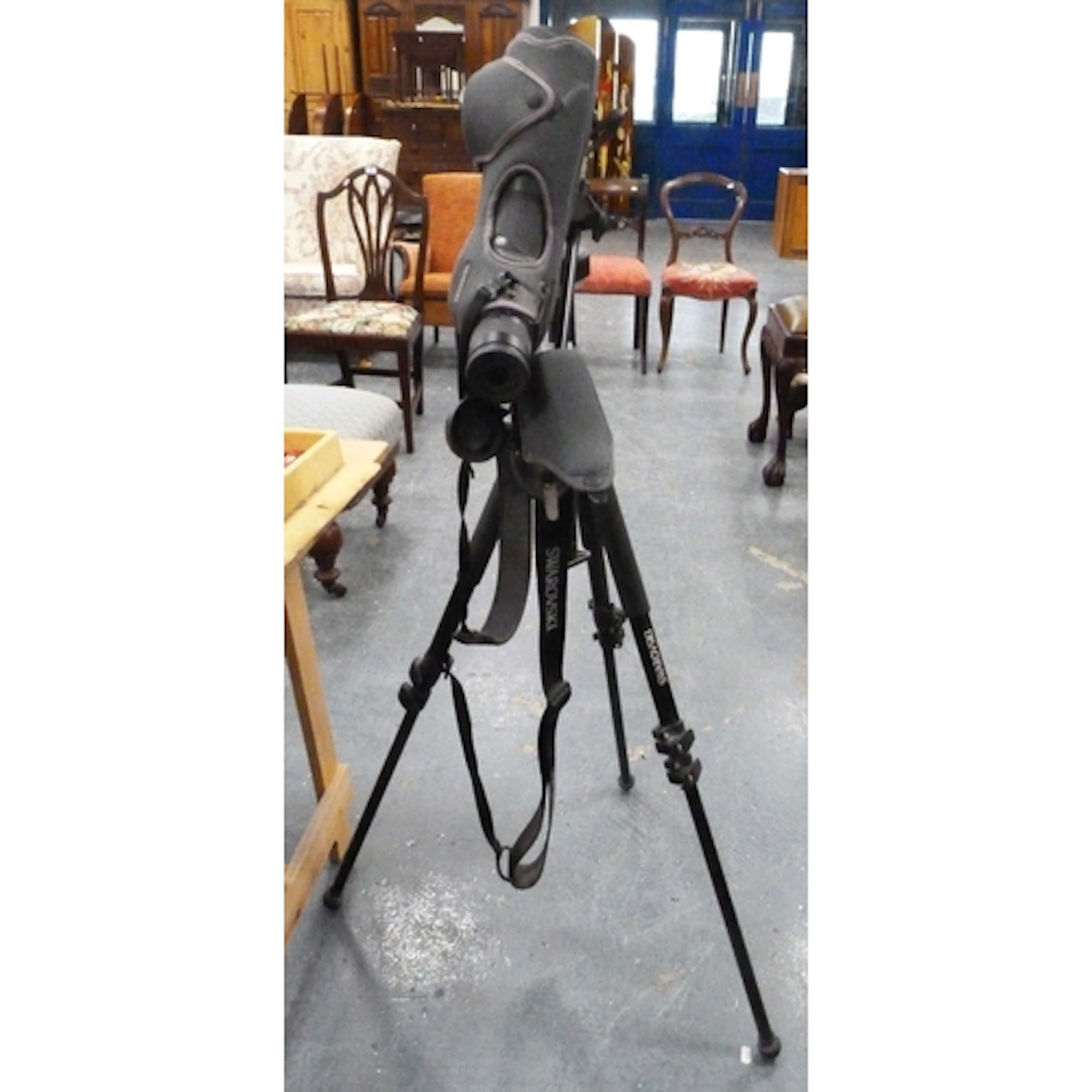 Swarovski HD telescope on tripod stand.