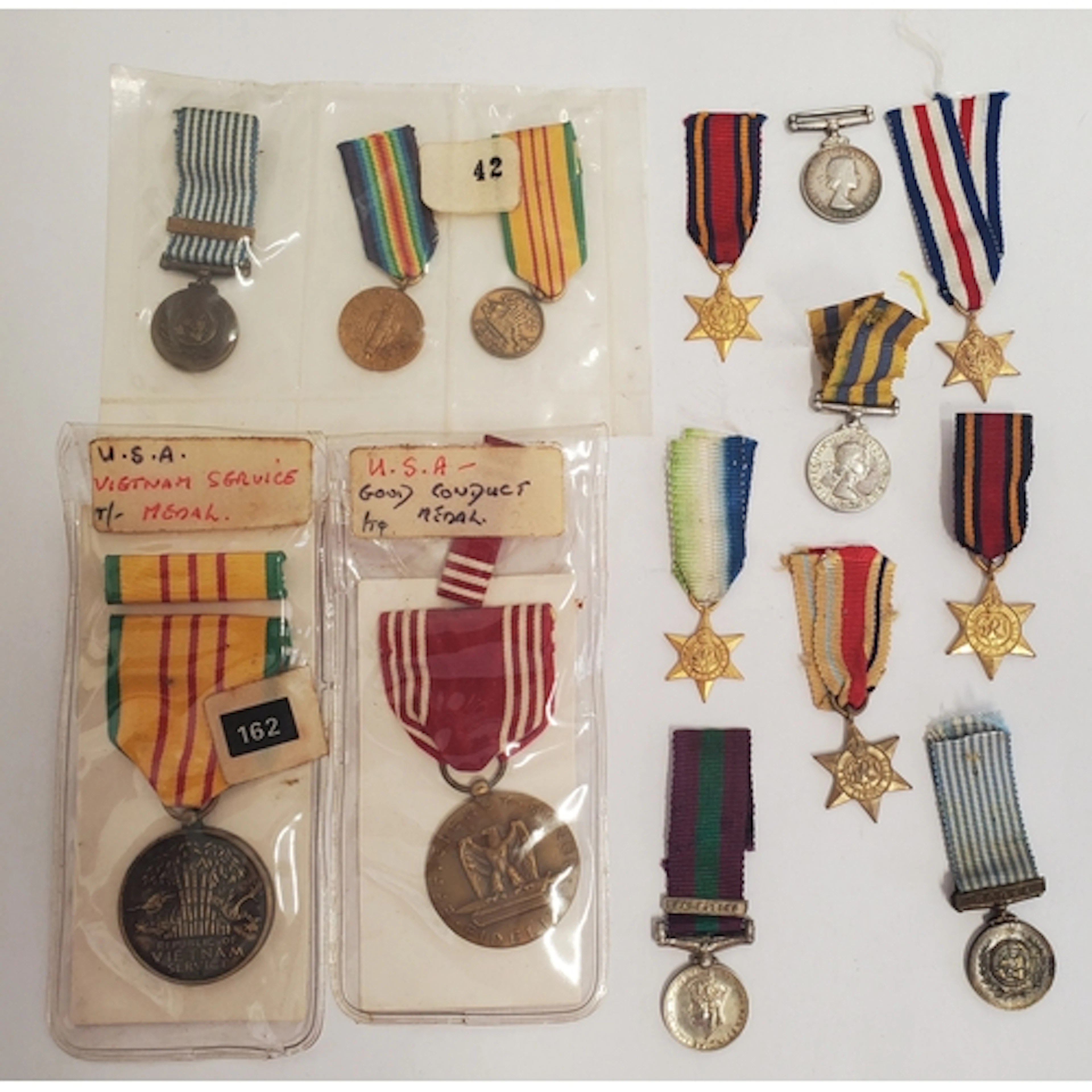 A collection of Miniature Medals including WWII Stars, Korea...
