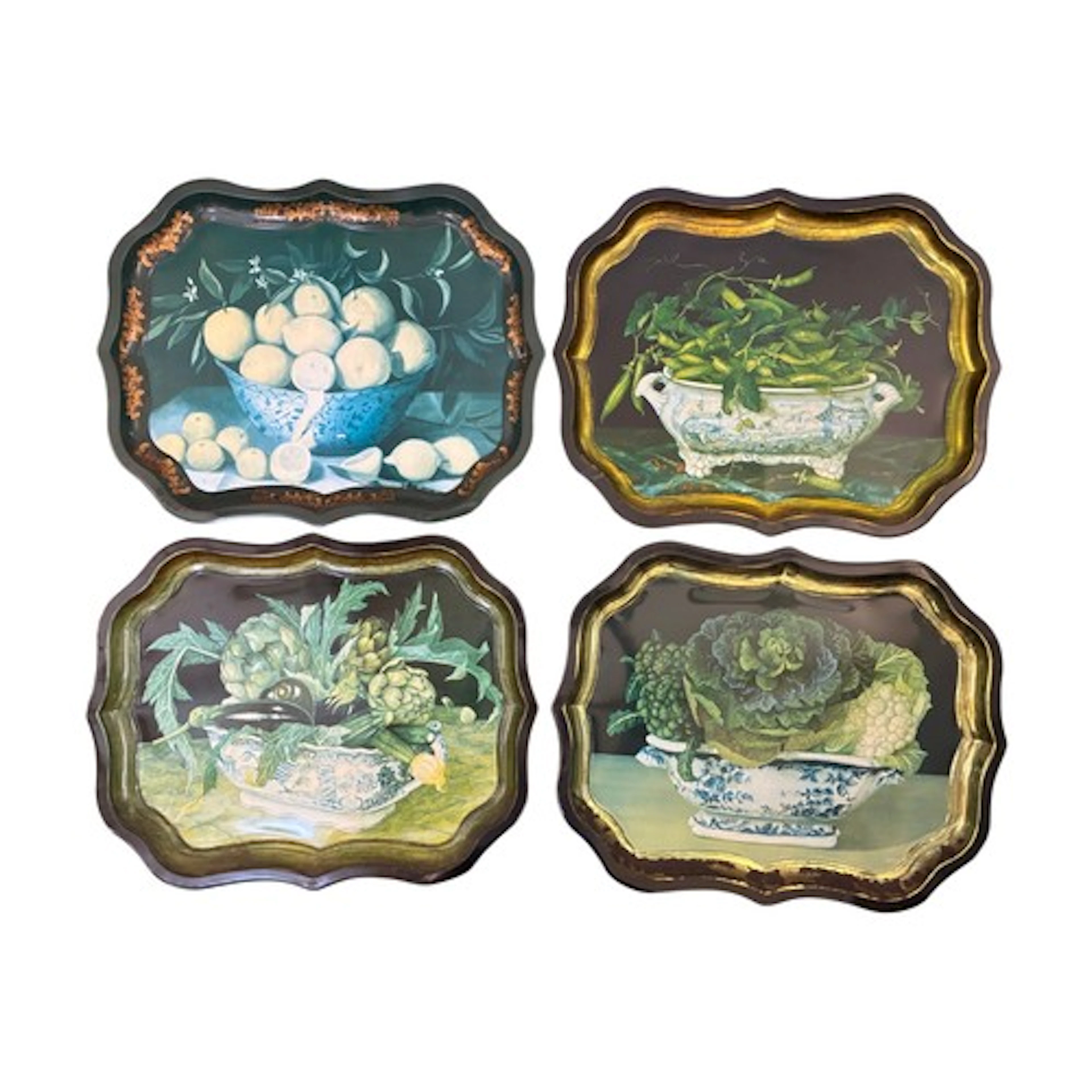 A set of four metal trays decorated in still life prints and...