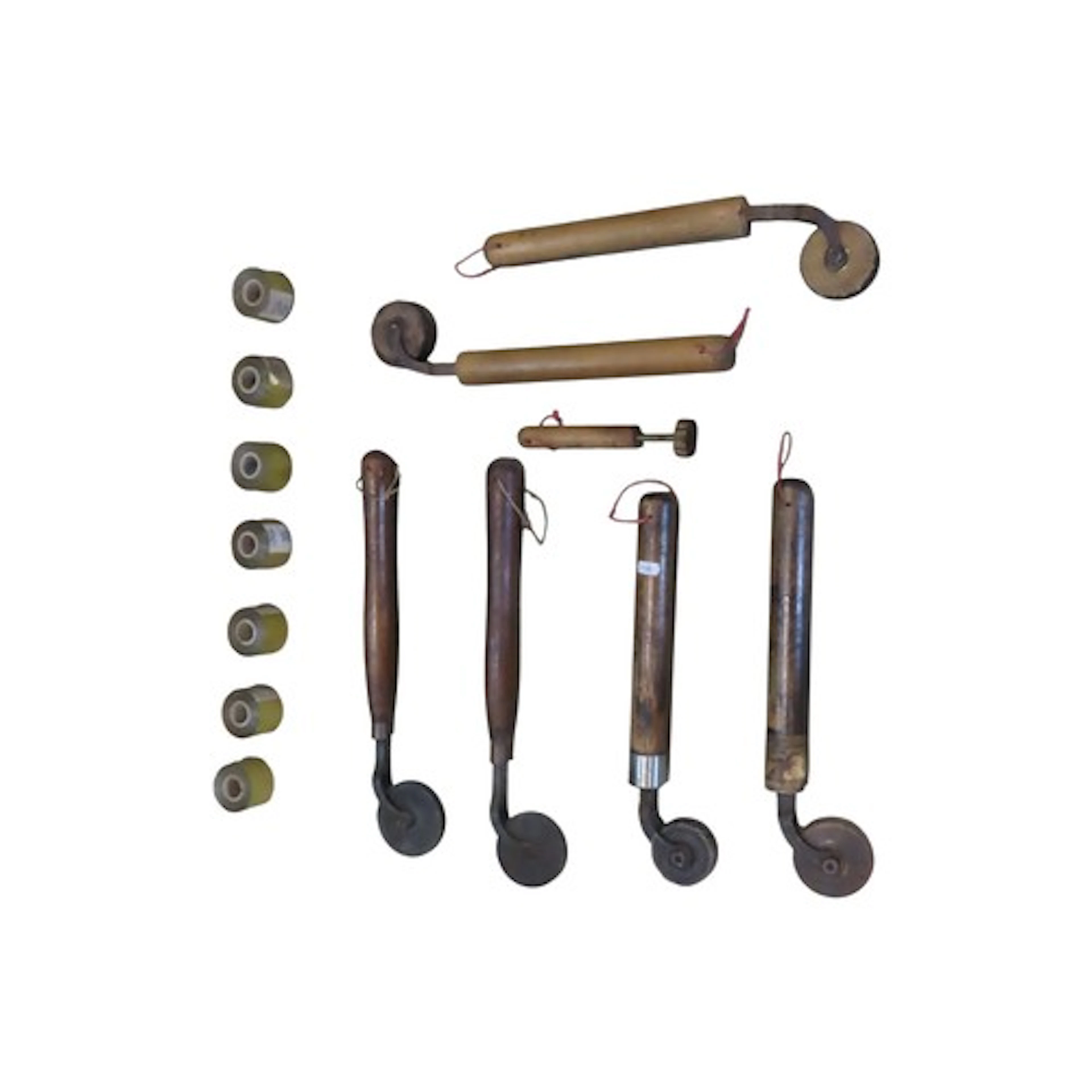 Six vintage embossing tools with wooden handles and revolvin...