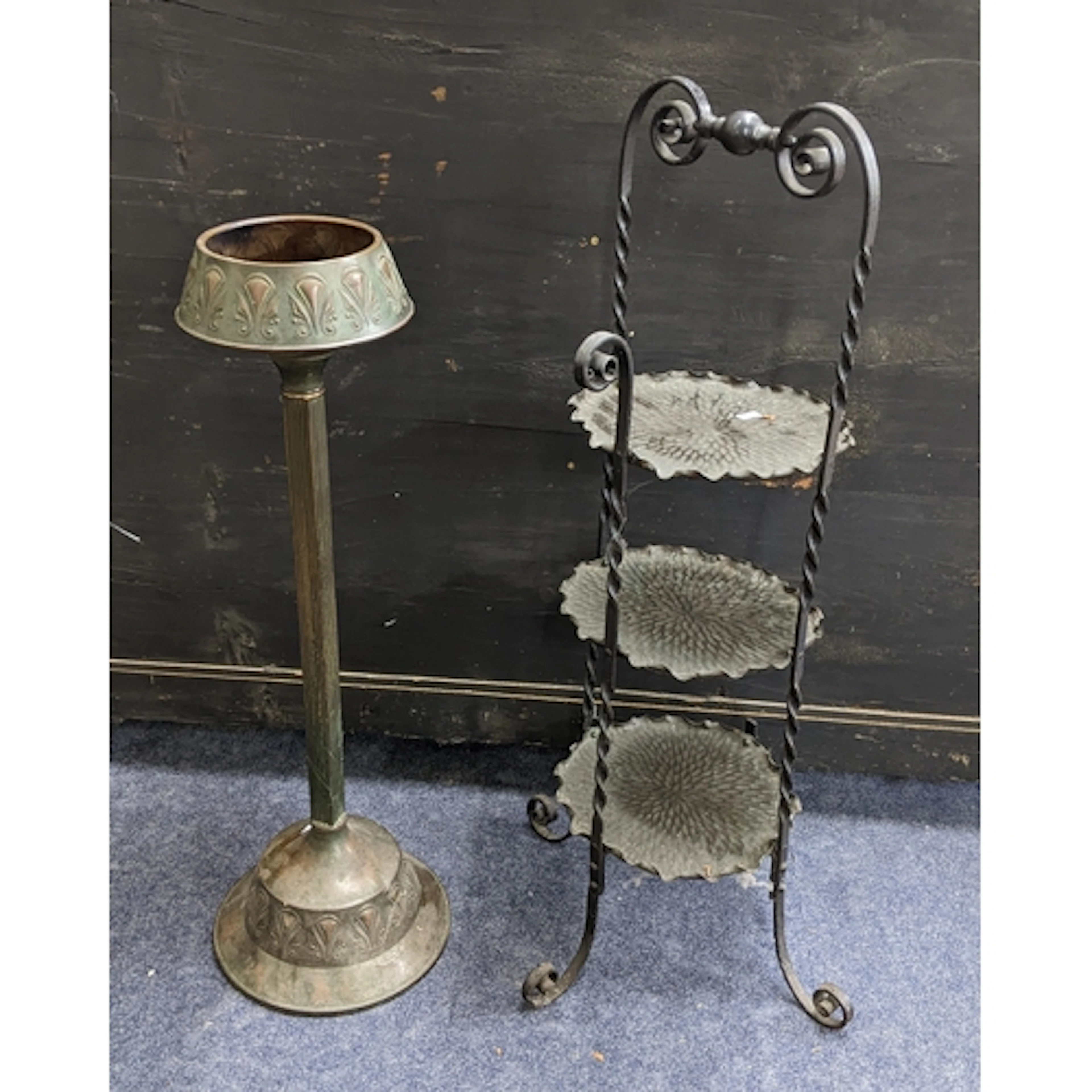 An Arts & Craft iron three tier cake stand together with an ...