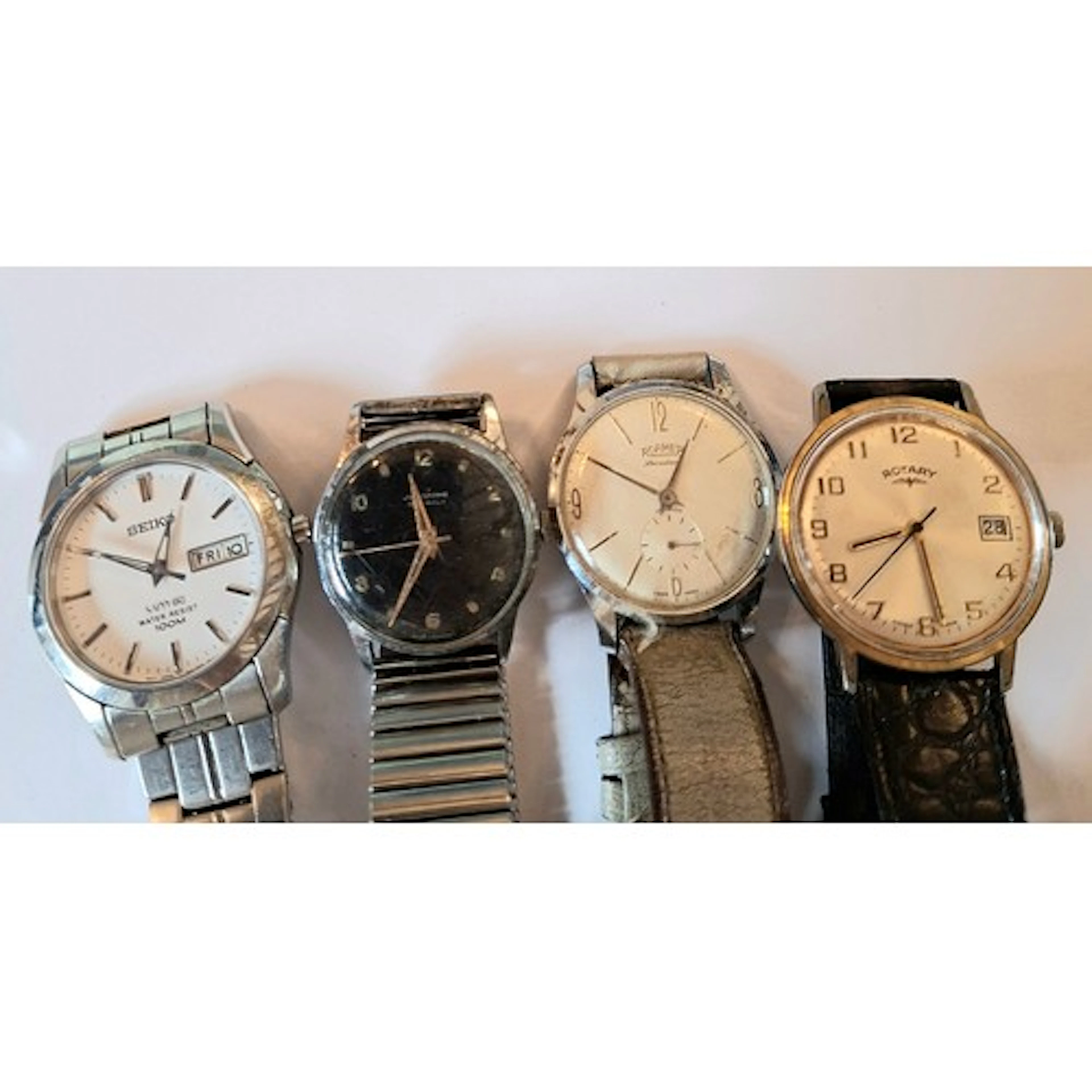 Four gents watches comprising a vintage Roamers, a vintage J...