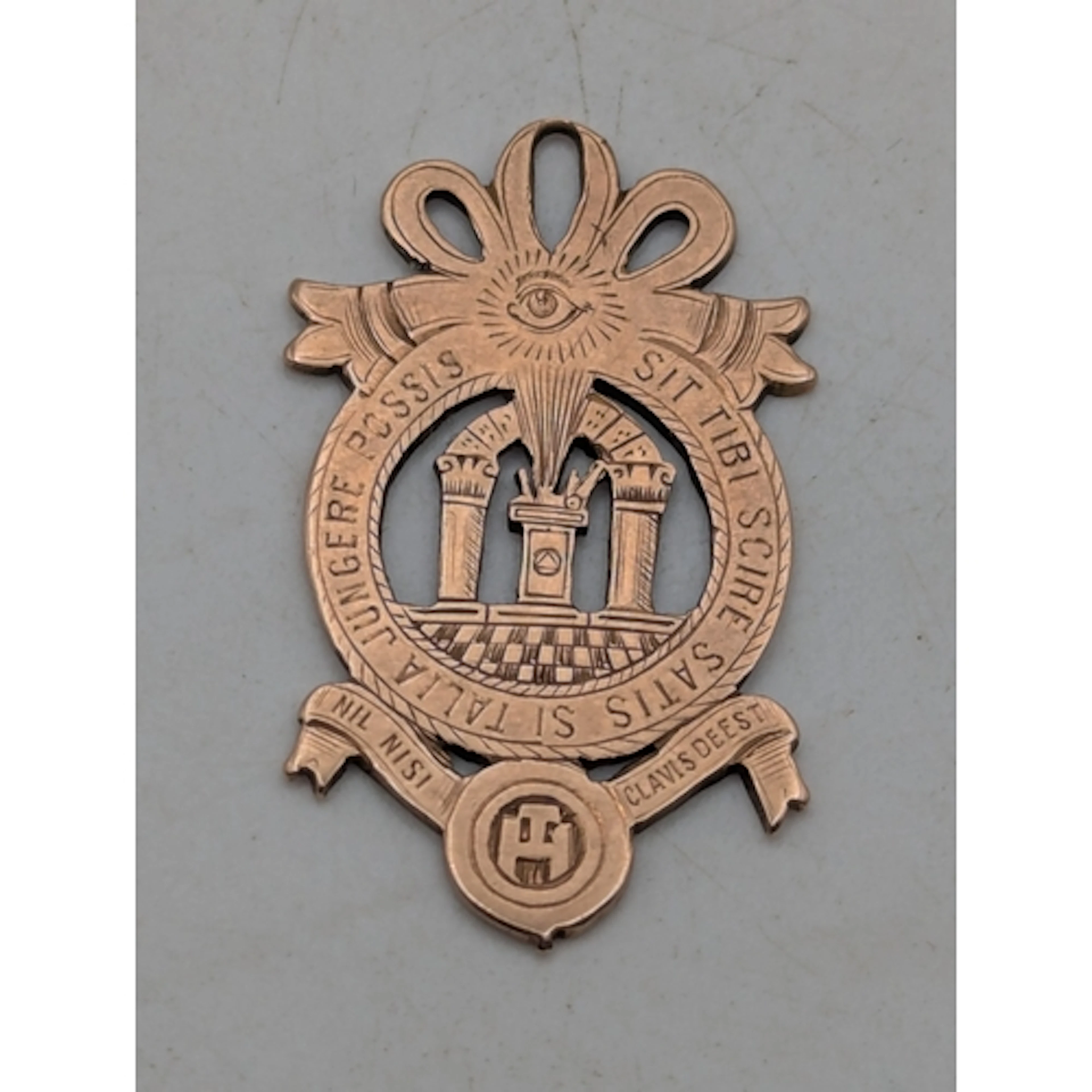 A 9ct rose gold Masonic medal, engraved with the All-Seeing ...