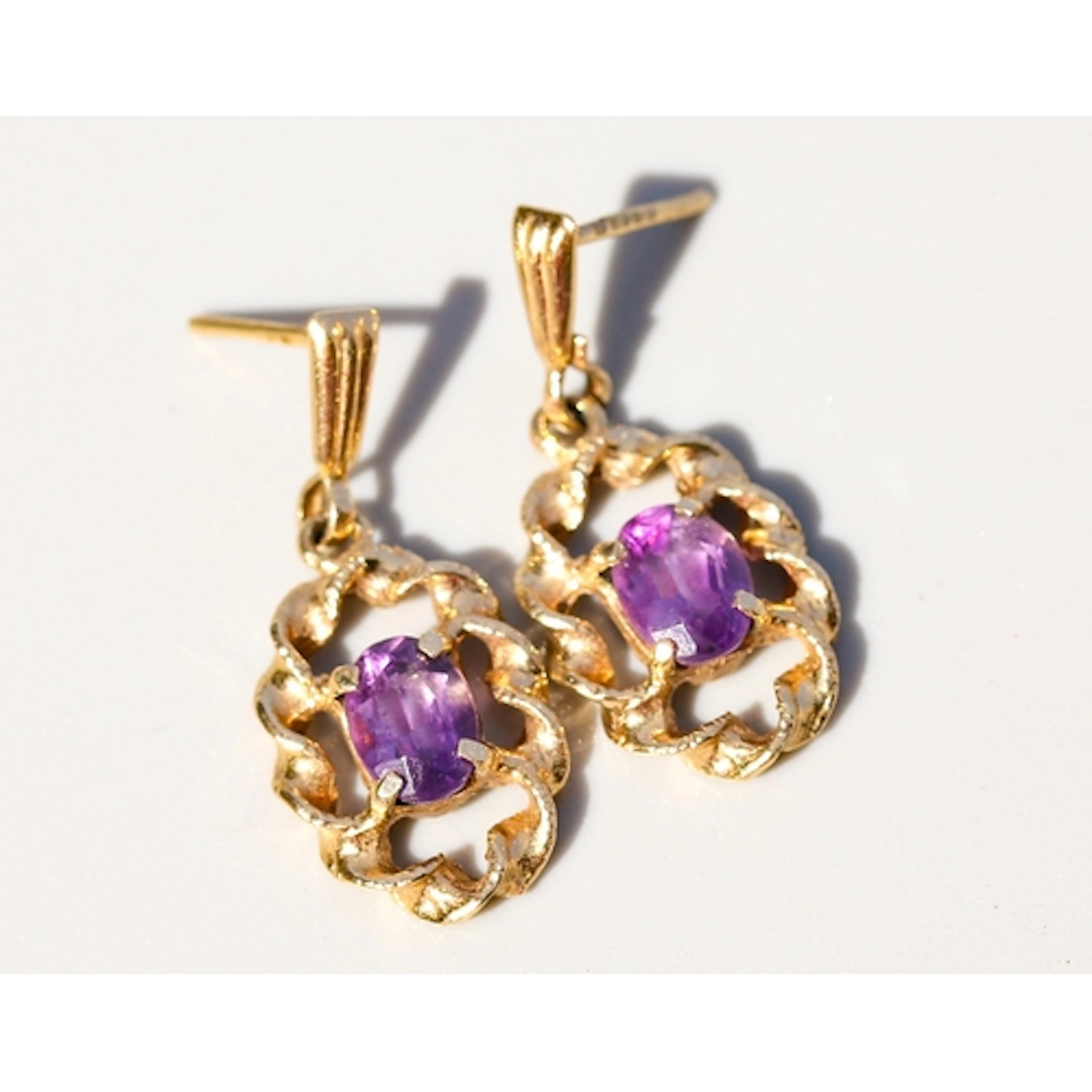 Pair of Amethyst Set, Twist Motif Drop Earrings, Mounted in ...