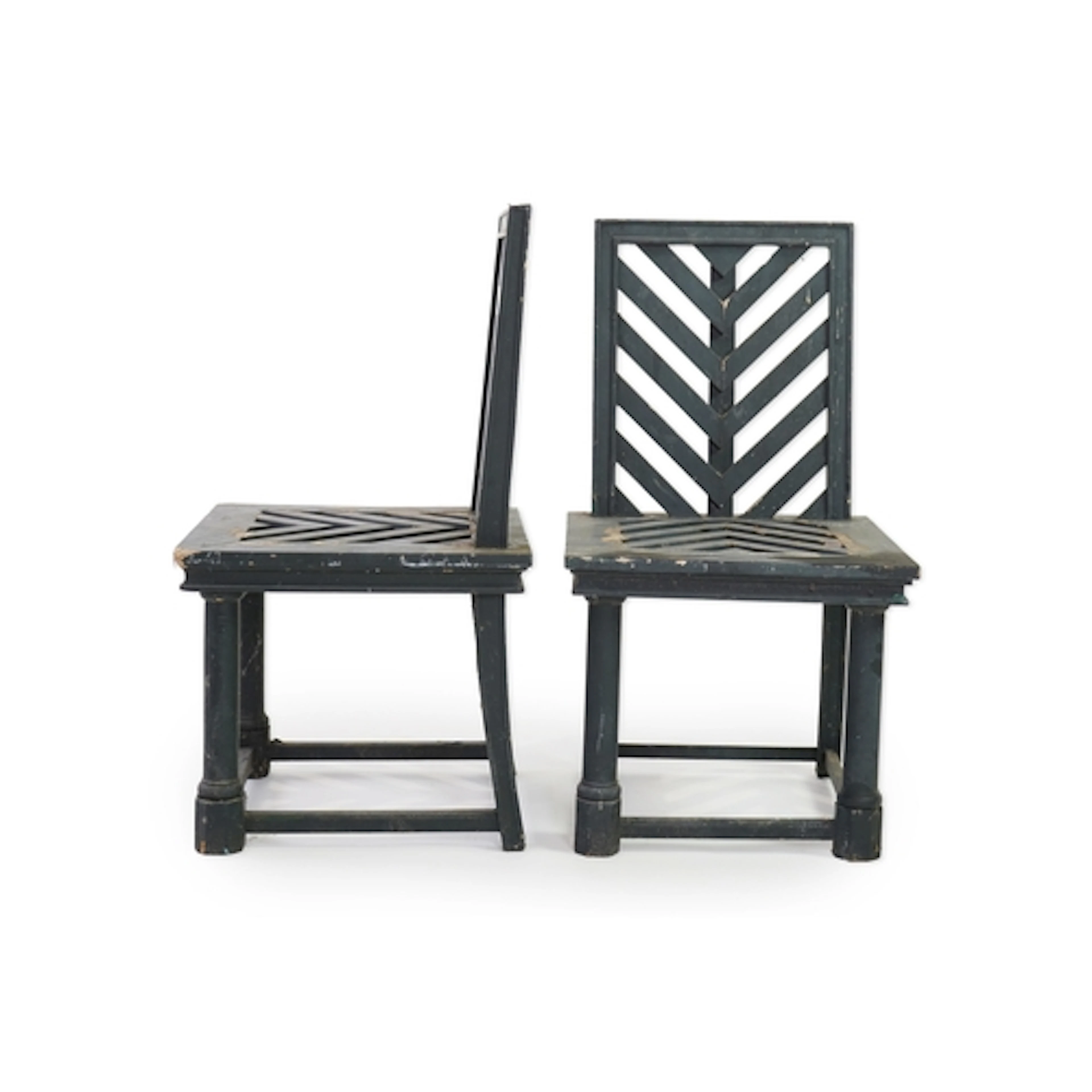 A set of fourteen green painted beech garden chairs, designe...