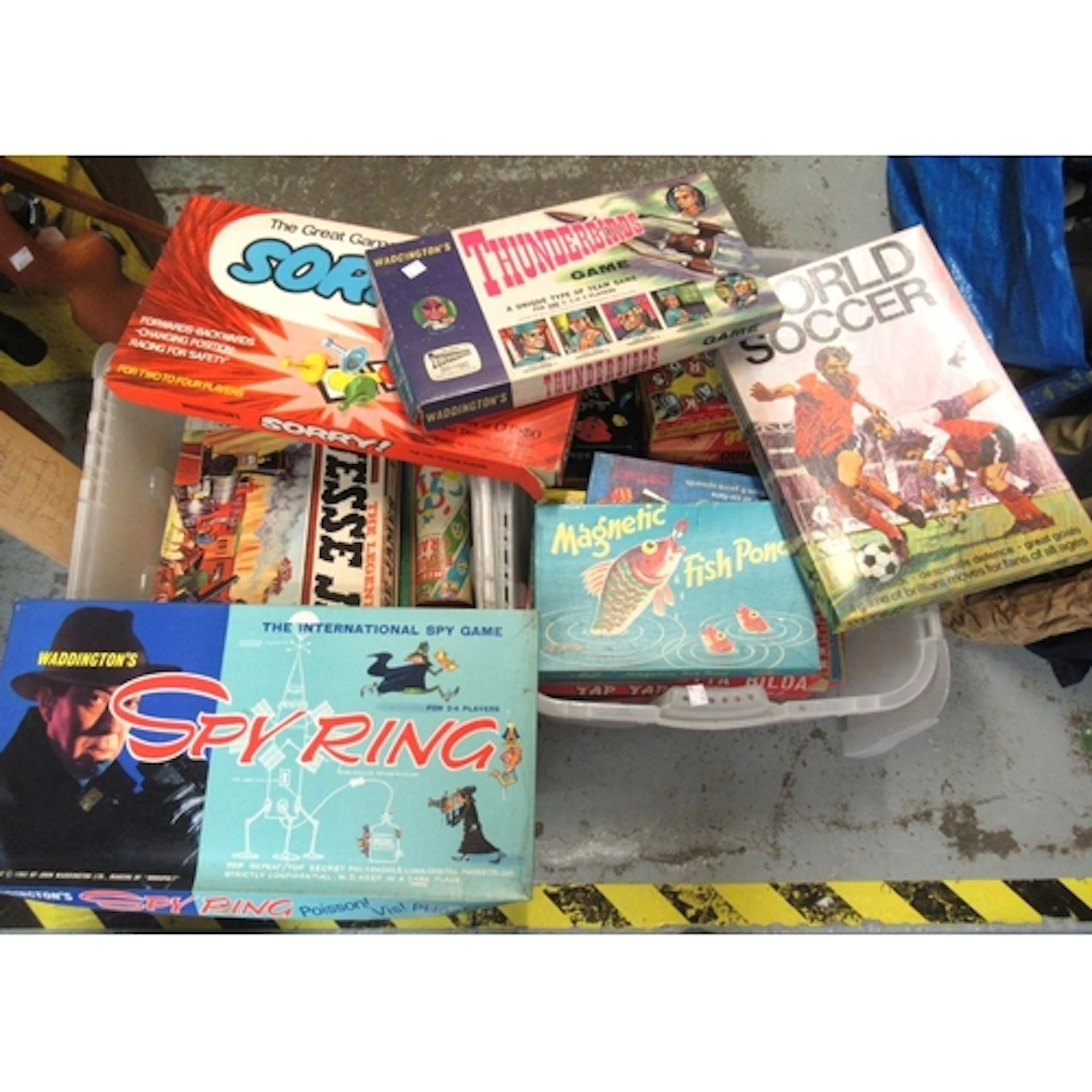 Two boxes containing a quantity of various board games