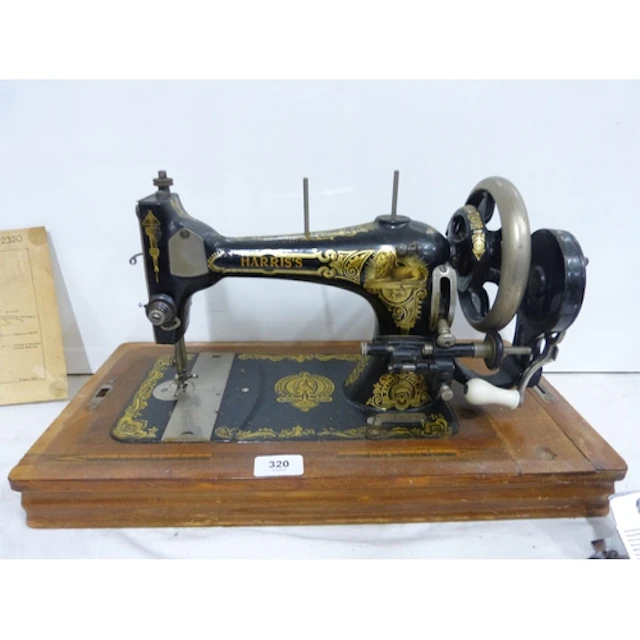 Antique Harris's German made sewing machine, cased circa 191...