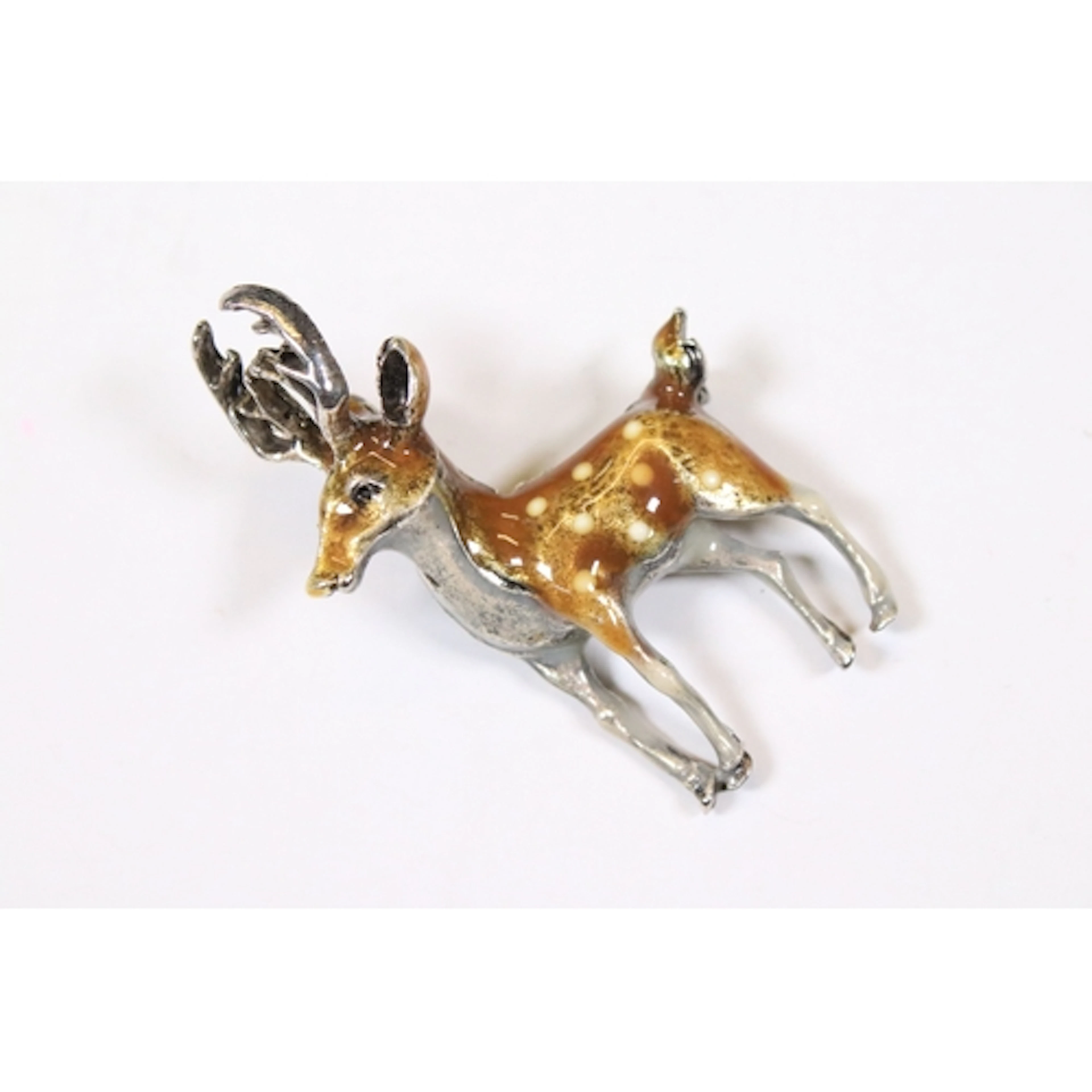 Large enamel brooch in the form of a stag, 5cm high