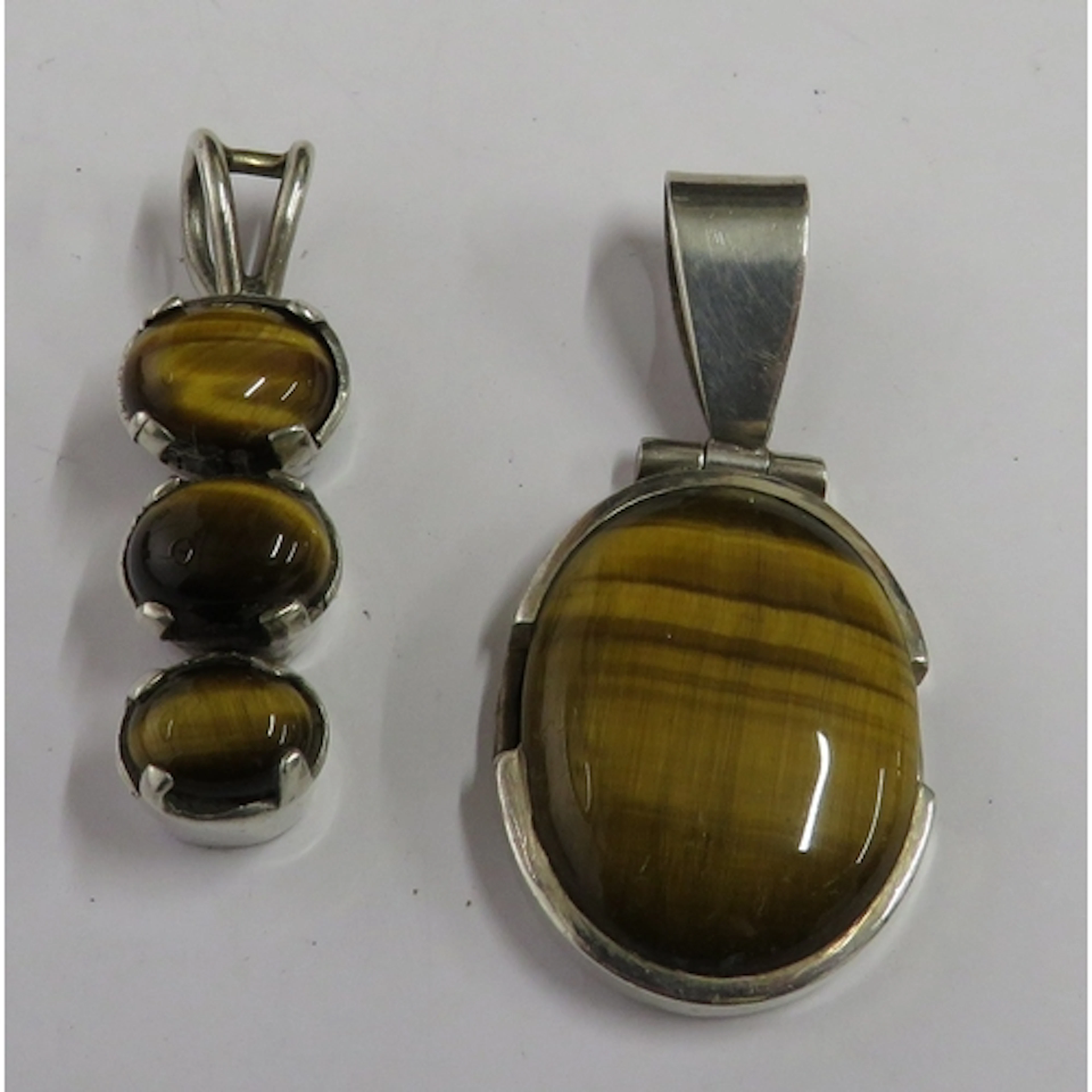 2 925 Silver Tigers Eye Pendants, 1 with large oval cabochon...