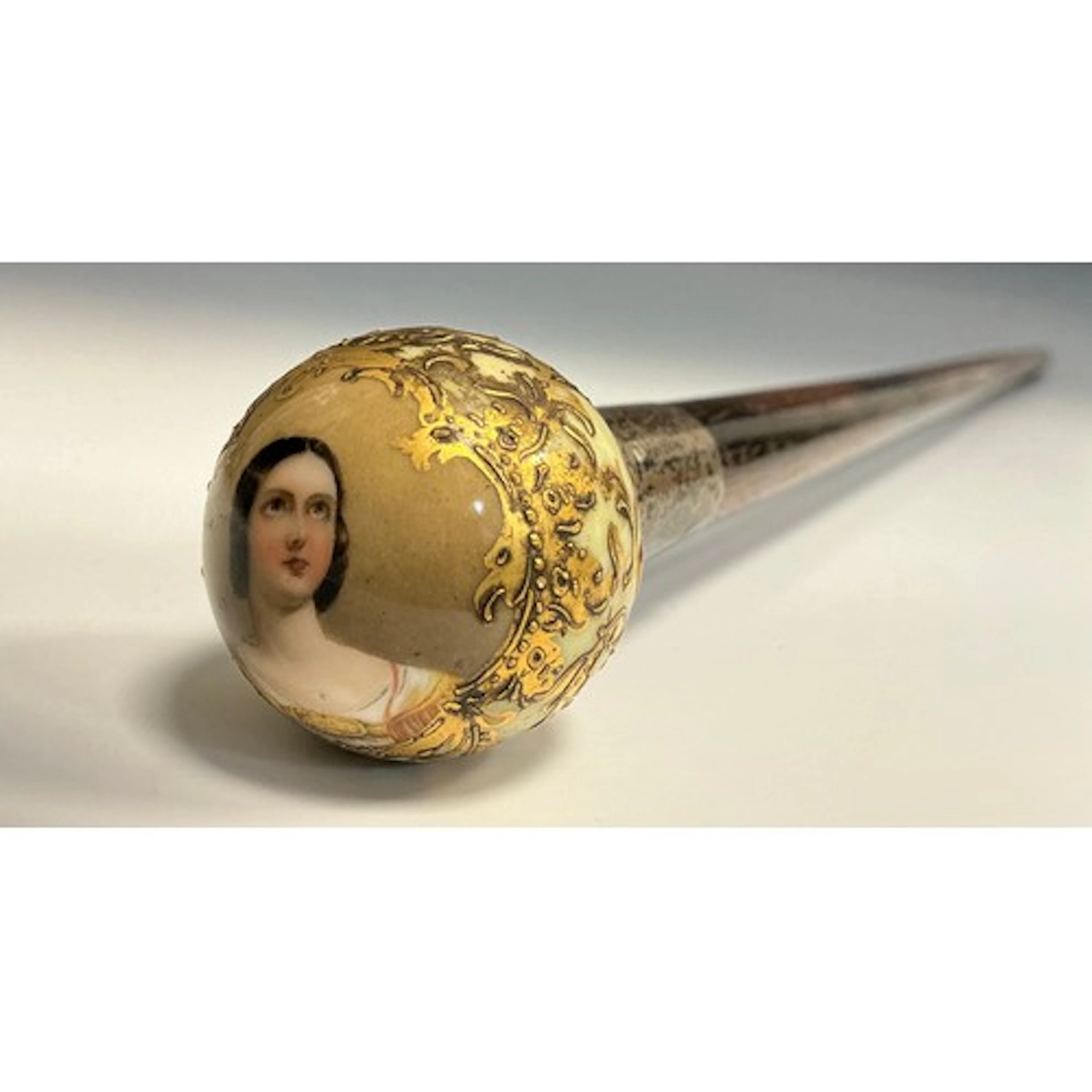 An Edwardian silver and porcelain mounted walking stick, the...